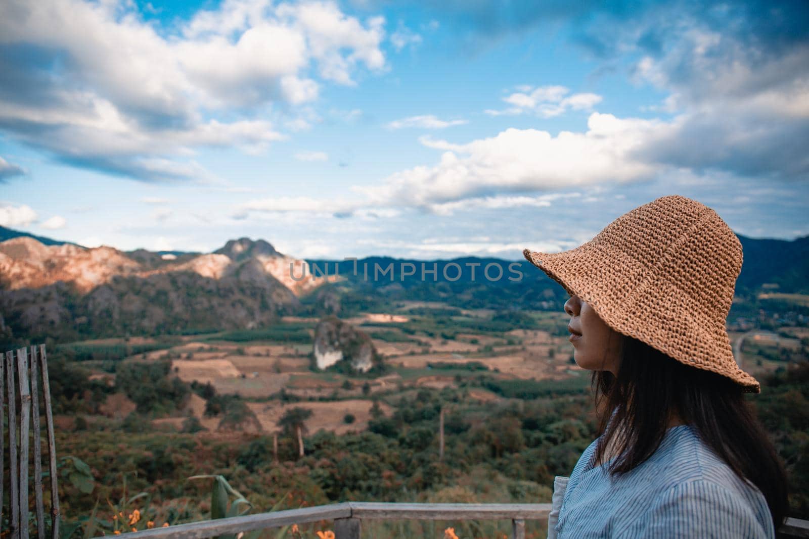 Woman standing on Phu Lang Ka, Phayao in Thailand.