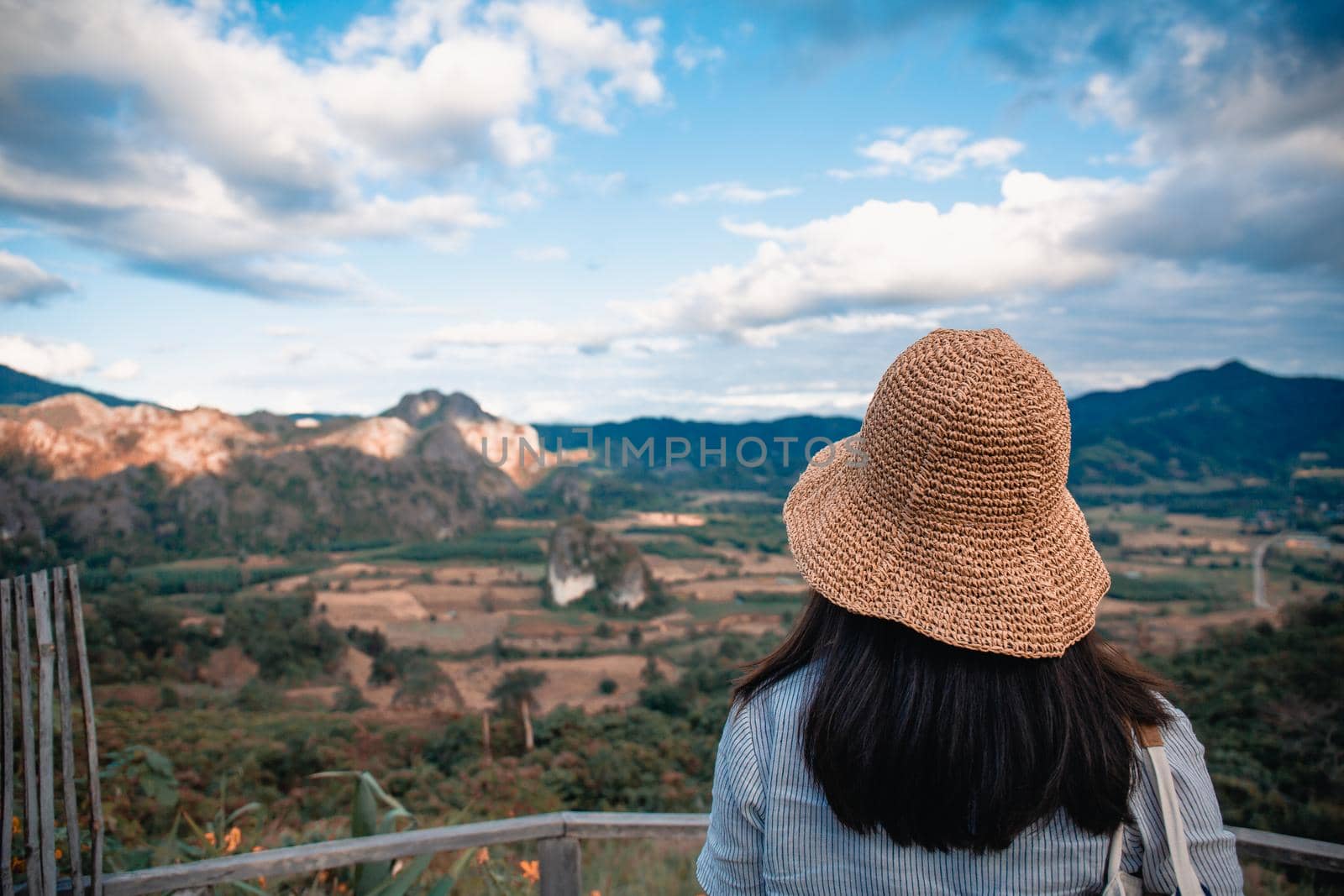 Woman standing on Phu Lang Ka, Phayao in Thailand by Benzoix