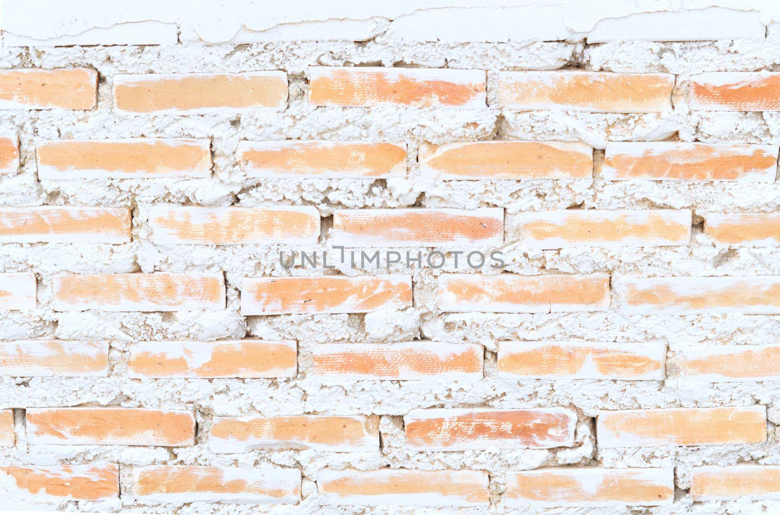 Empty old brick wall painted texture happy red-brown wall wide grunge brick wall shabby building with damaged plaster abstract web banner copy space by noppha80