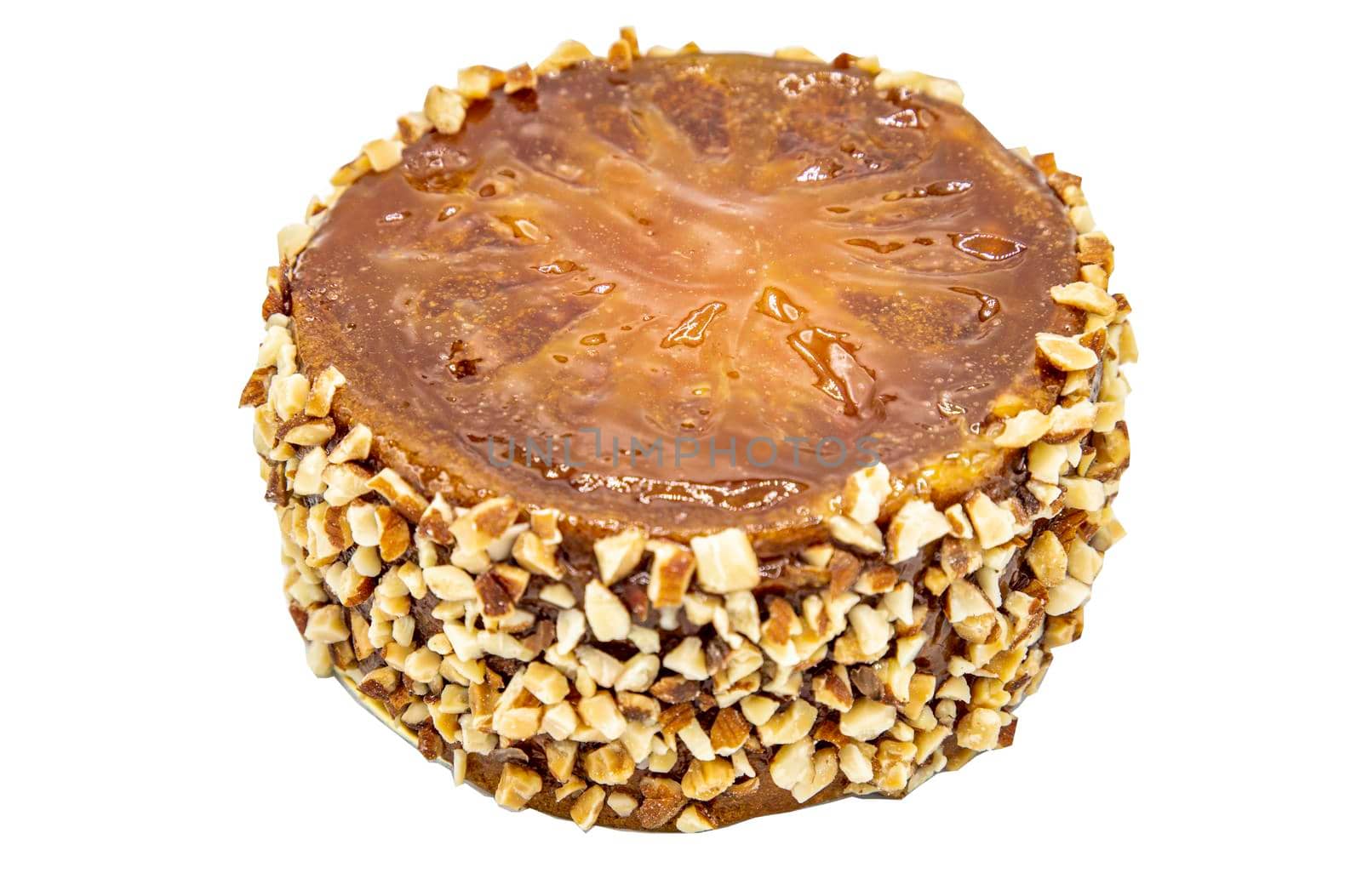 Fusion thai sweet dessert : Bael fruit cake isolated on white background with clipping path. Delicious seasonal breakfast. Selective focus.