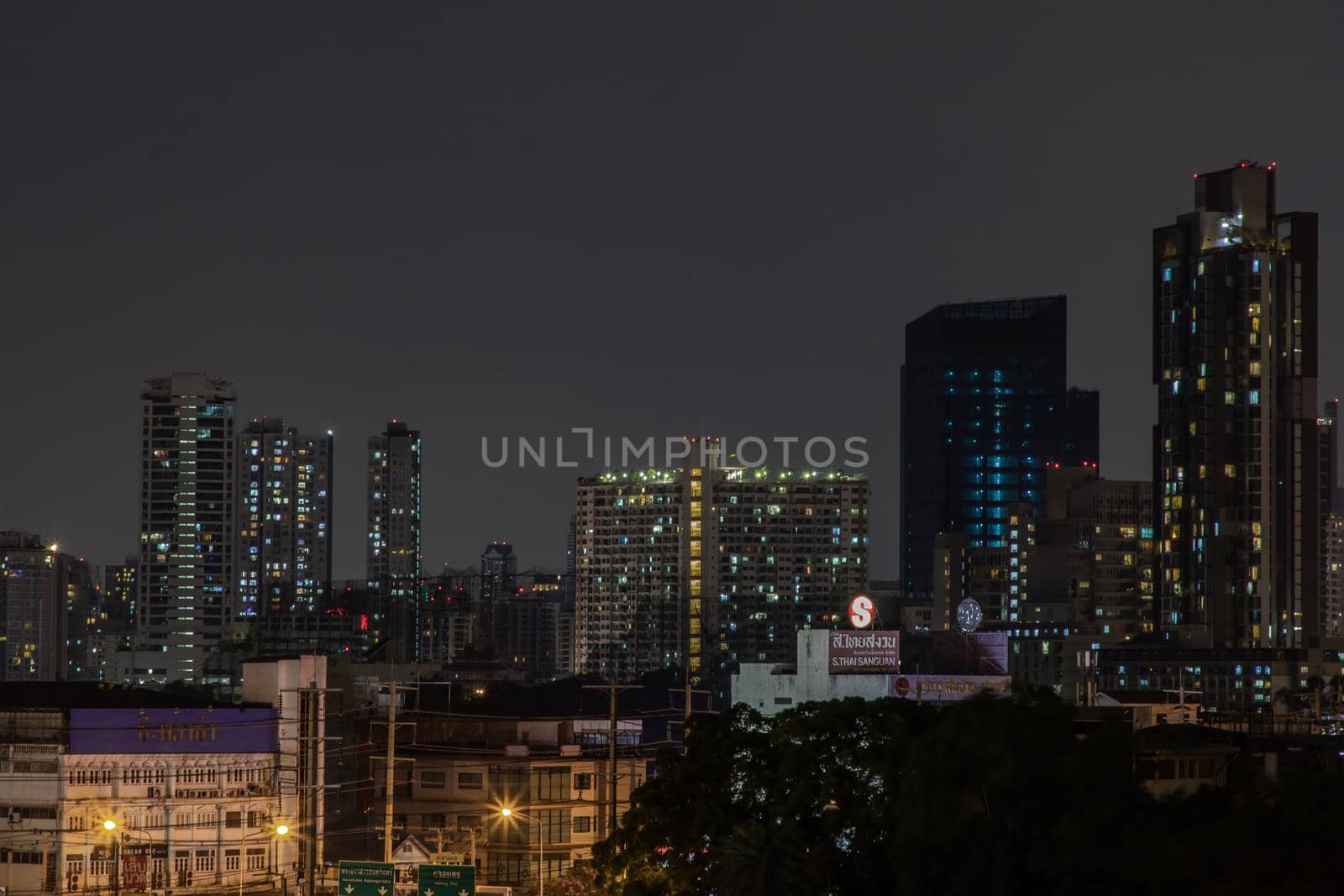 Bangkok, Thailand - 05 Apr 2020 : Bangkok downtown at night view in the business district, Beautiful twilight give the city a modern style, Selective focus.