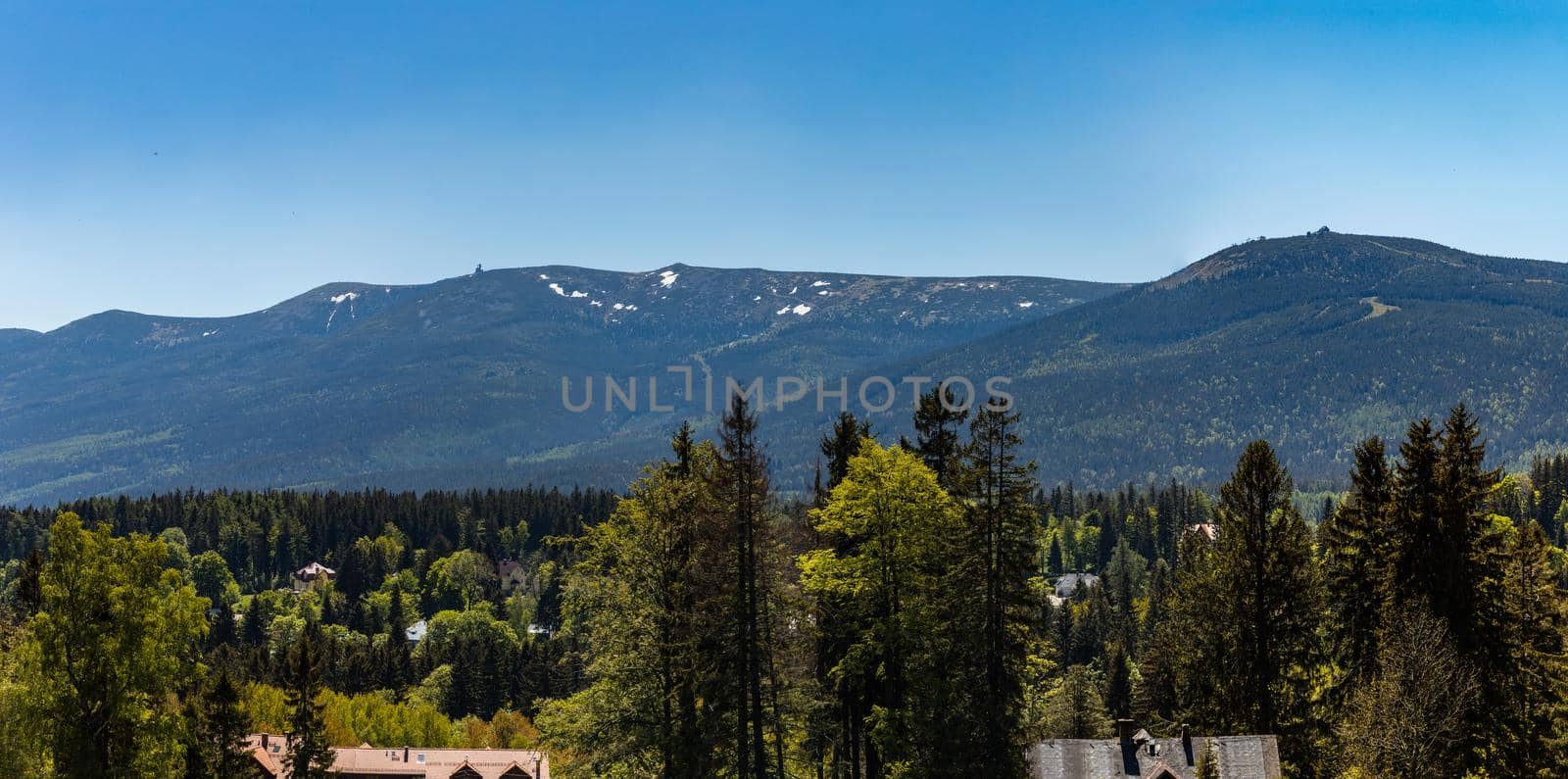 Panorama of Karkonosze Giant Mountains over trees in Szklarska Poreba