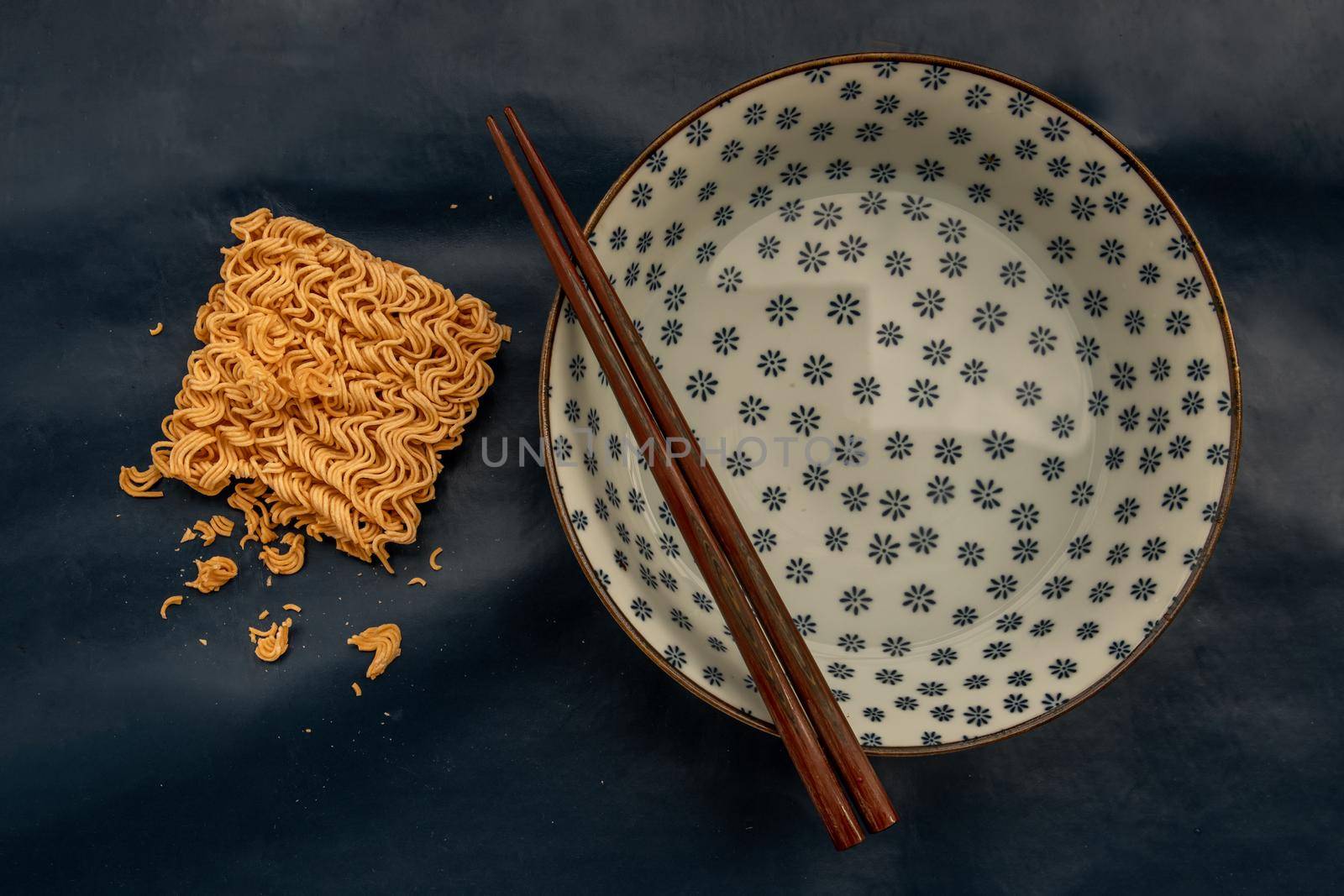 Easy food, Dried instant noodles and hot water in a bowl.