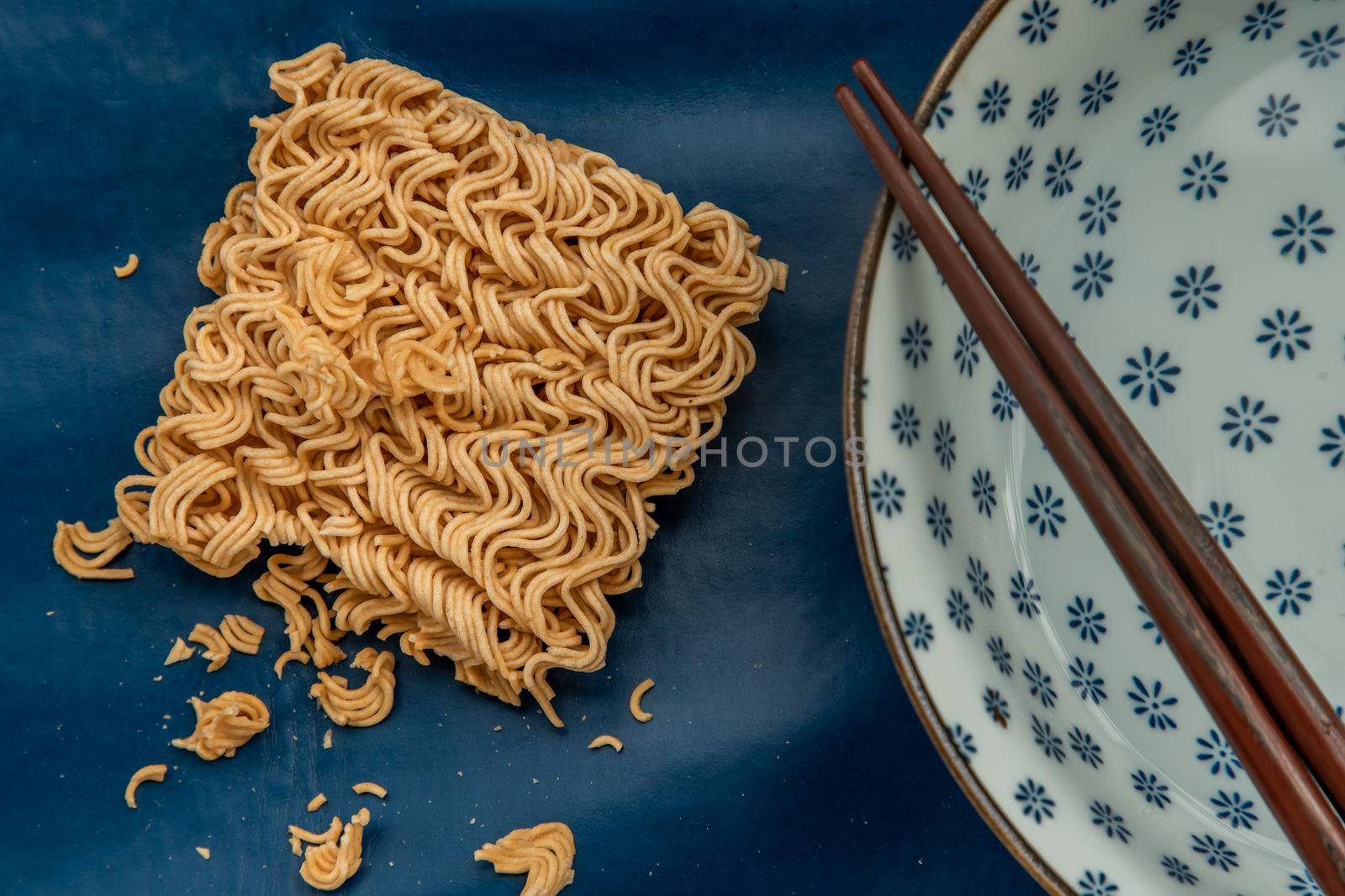 Easy food, Dried instant noodles and hot water in a bowl.