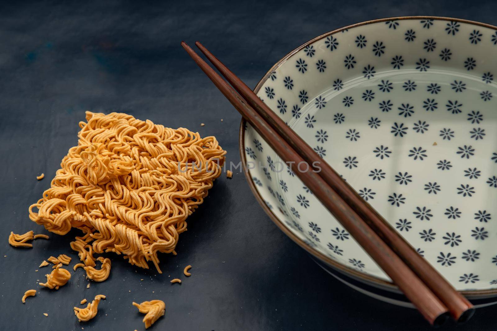 Easy food, Dried instant noodles and hot water in a bowl.