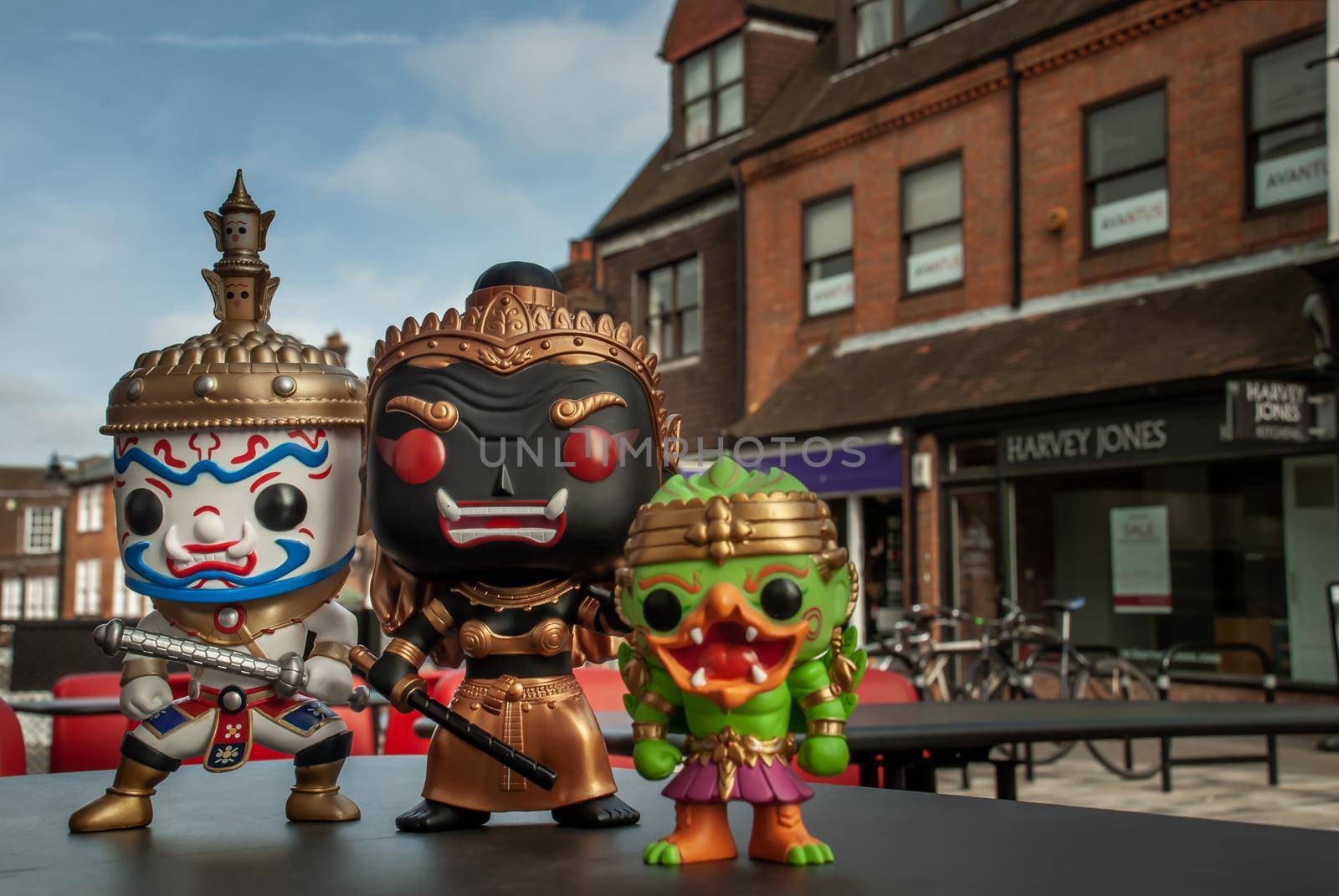 London, England - Jan 13, 2019 : Ravana, Giantess and Hanuman Happy traveller visiting in England. Traveller doll.