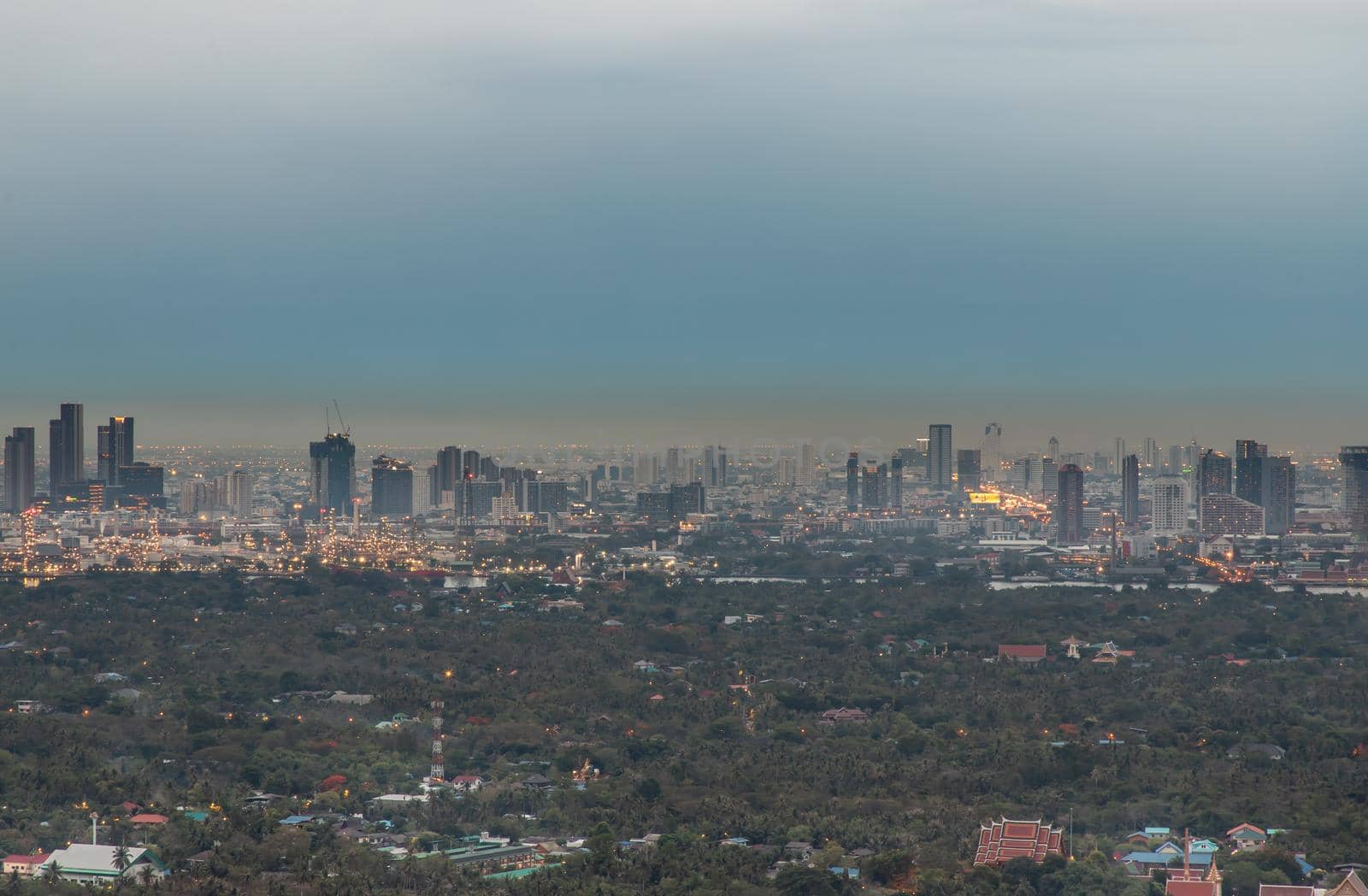 Bangkok, thailand - May 11, 2020 : Sky view of Bangkok with skyscrapers in the business district in Bangkok in the evening beautiful twilight give the city a modern style. Selective focus.