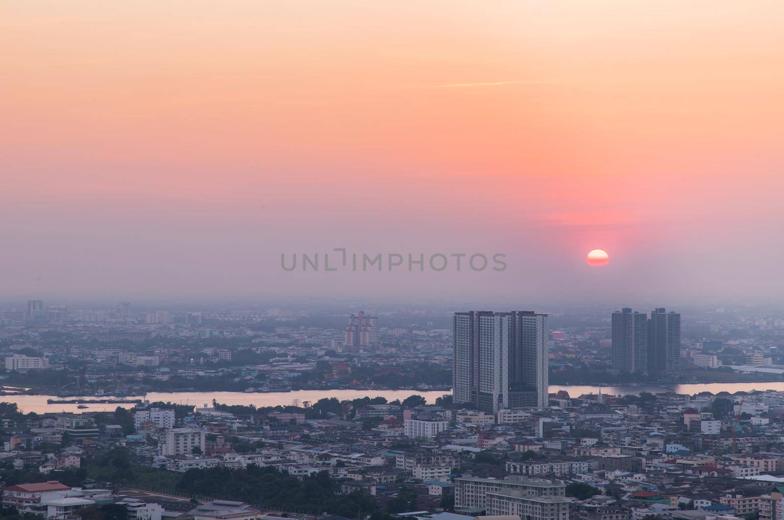 Bangkok, Thailand - Jan 12, 2021 : Aerial view of Amazing beautiful scenery view of Bangkok City skyline and skyscraper before sun setting creates relaxing feeling for the rest of the day. Evening time, Selective focus.