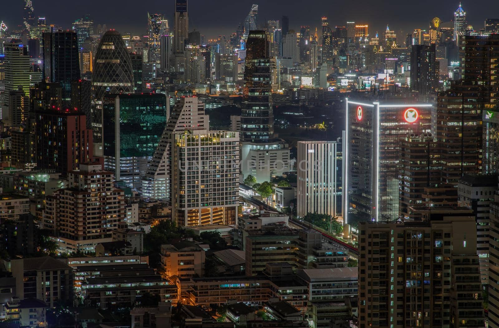 Bangkok, thailand - Aug 28, 2020 : Bangkok downtown cityscape with skyscrapers at night give the city a modern style. Selective focus.