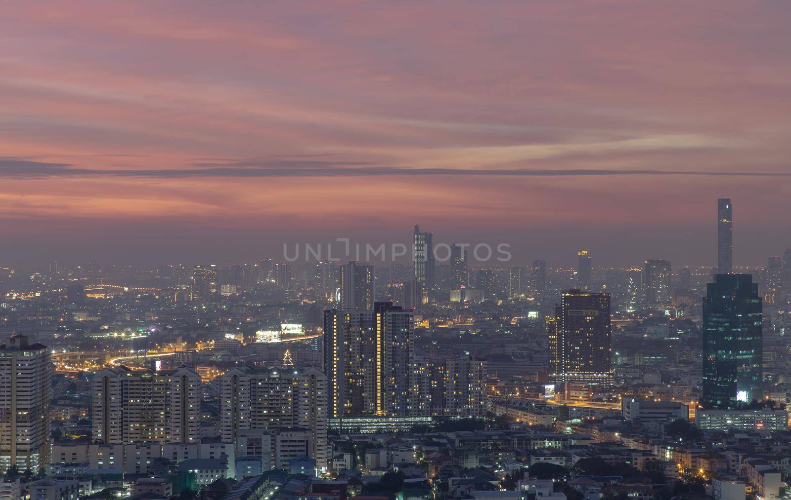 Bangkok, thailand - Dec 23, 2020 : Bangkok downtown cityscape in Business district with bright glowing lights at night give the city a modern style. No focus, specifically.