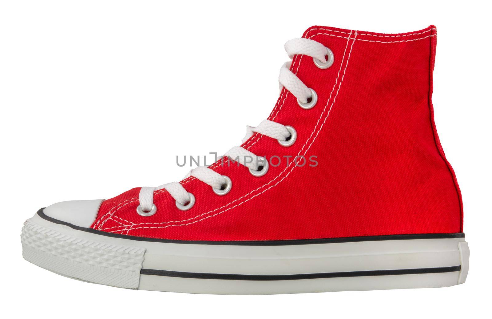 A Retro Red Canvas Sneaker On A White Background