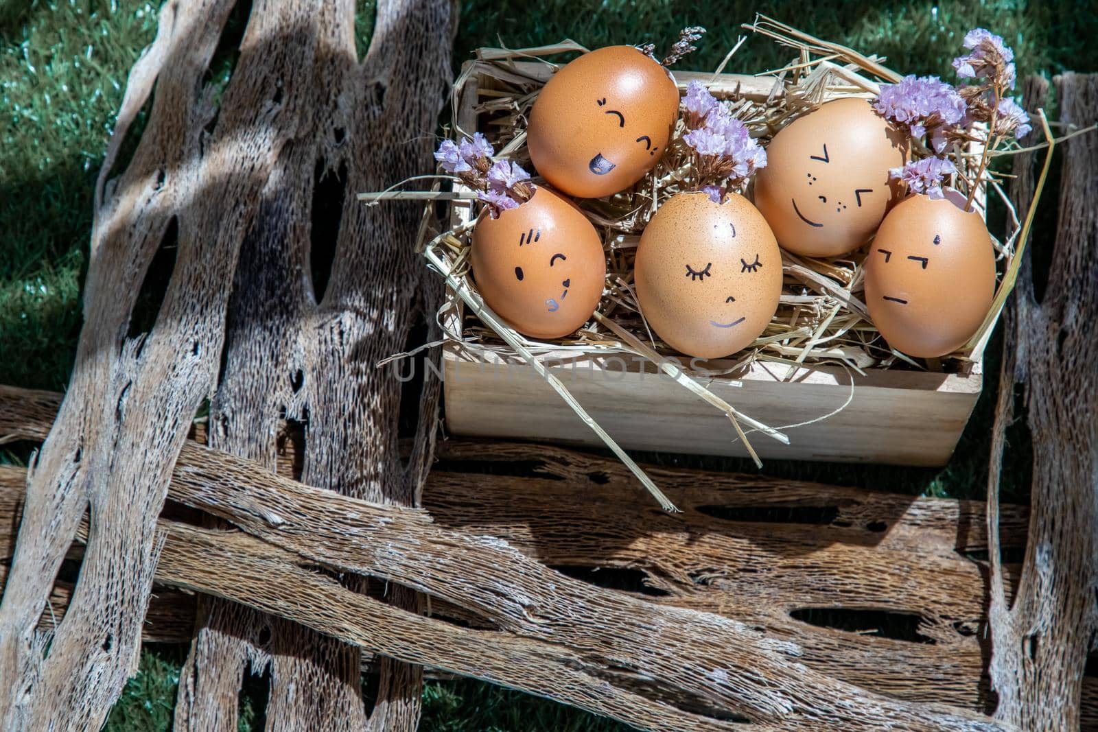 A conceptual image of Group of eggs with various emotions. Representing racial harmony, Diversity, integration and emotional, Happy and relaxing concept.