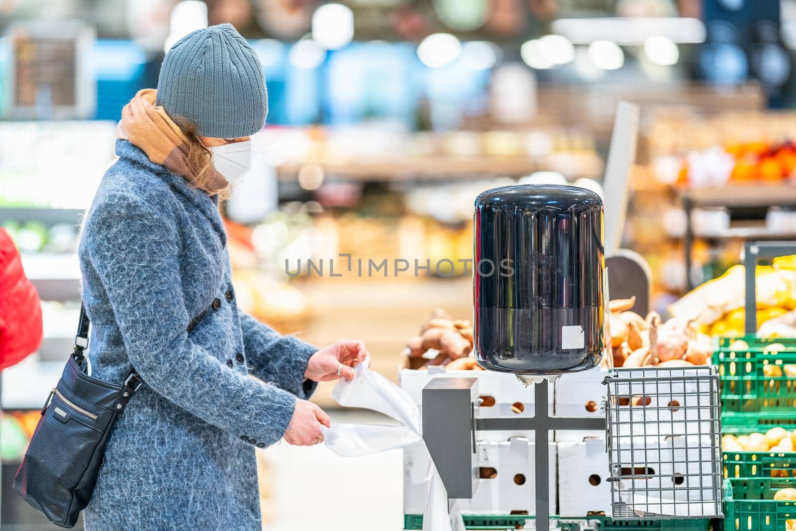 woman uses plastic bags for food in the shopping mall.