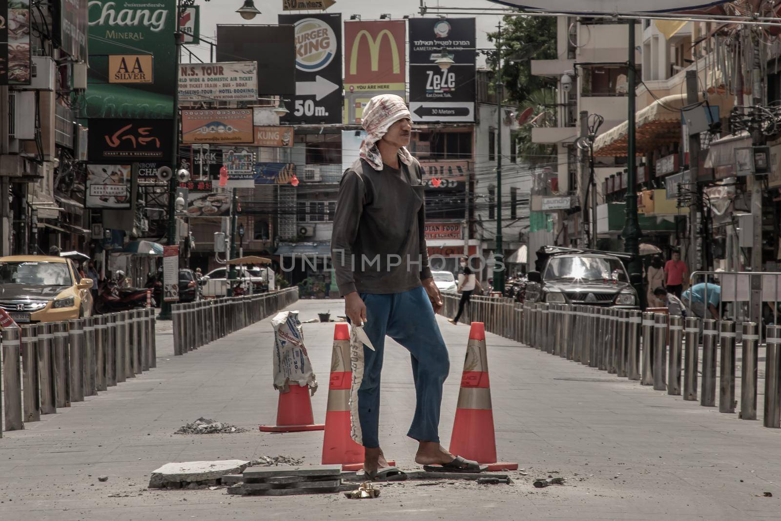 Bangkok, Thailand - Jun 19, 2020 : Labor is working on street reconstruction on Khaosan road.