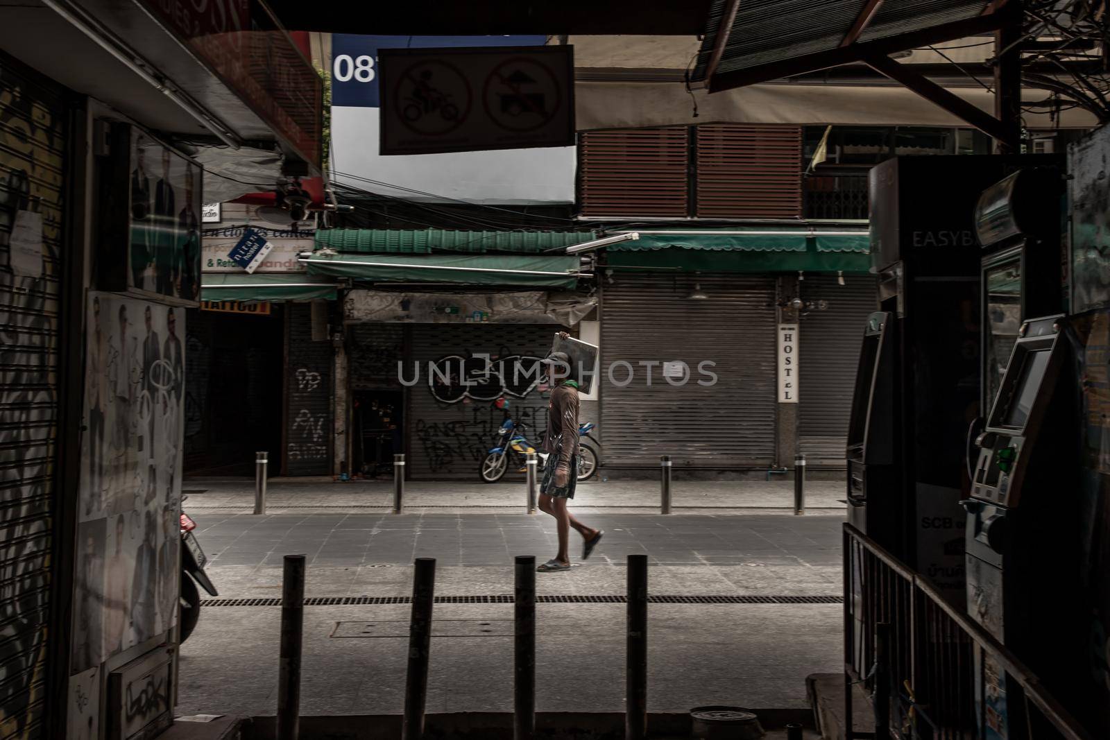 Bangkok, Thailand - Jun 19, 2020 : Labor is carrying tiles for street reconstruction Khaosan road.