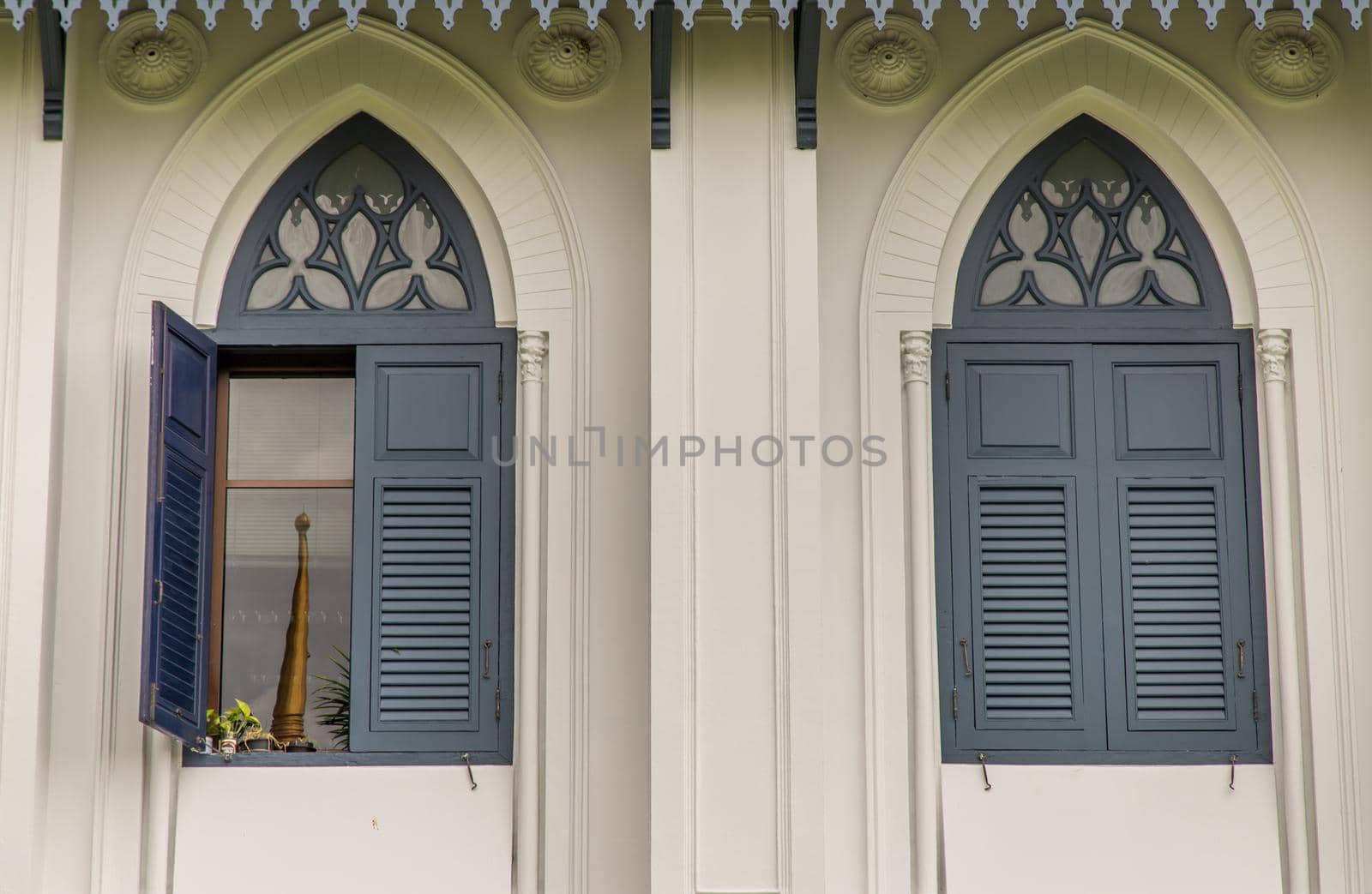 Bangkok, Thailand - Jun 19, 2020 : The beauty of the ancient wooden windows of the Grand Palace. The complexion of buildings.