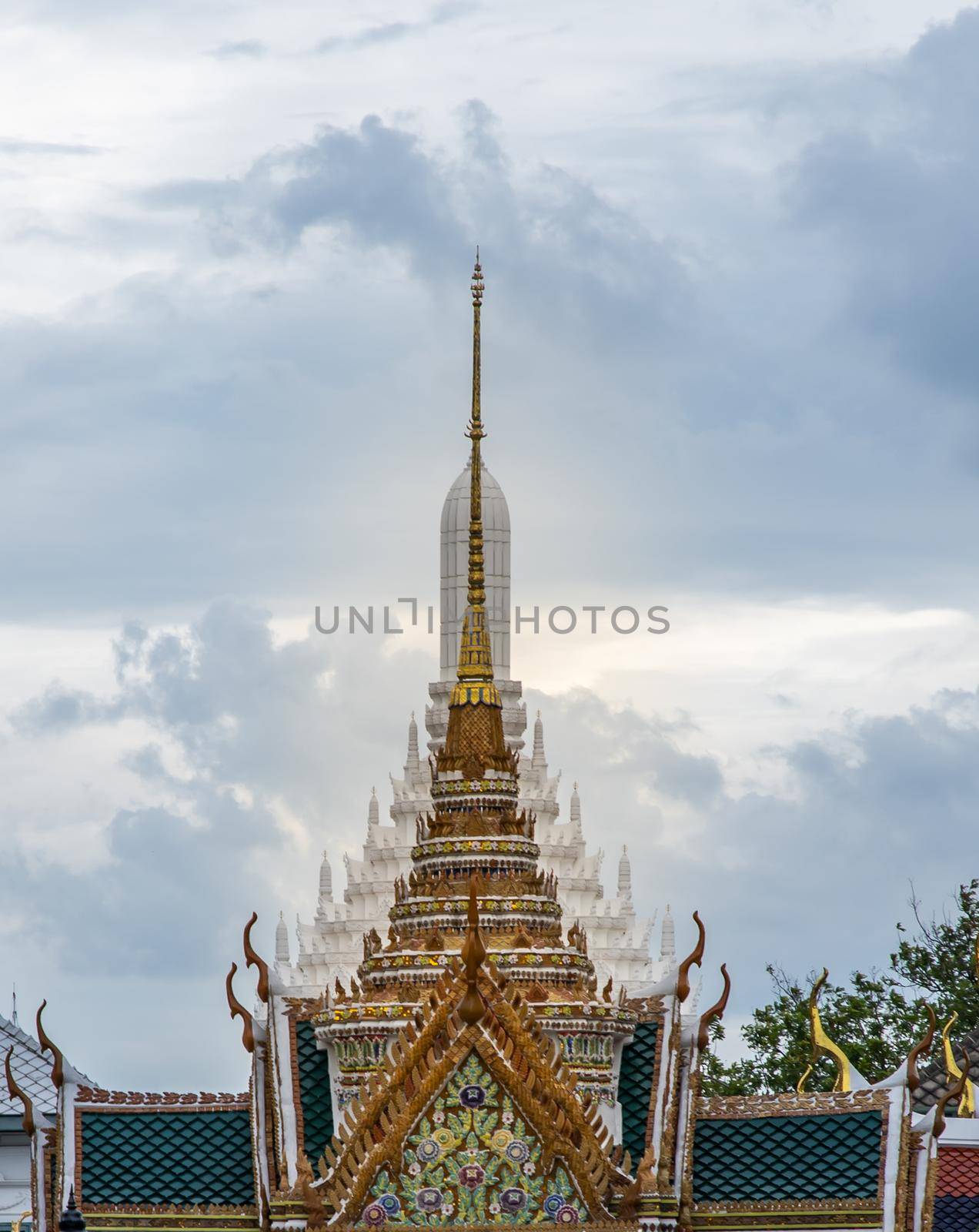 Bangkok, Thailand - Jun 19, 2020 : Beautiful Thai architecture of buildings in The Temple of the Emerald Buddha, the most sacred Buddhist temple in Thailand, it is also a potent religion symbolic of Thailand.