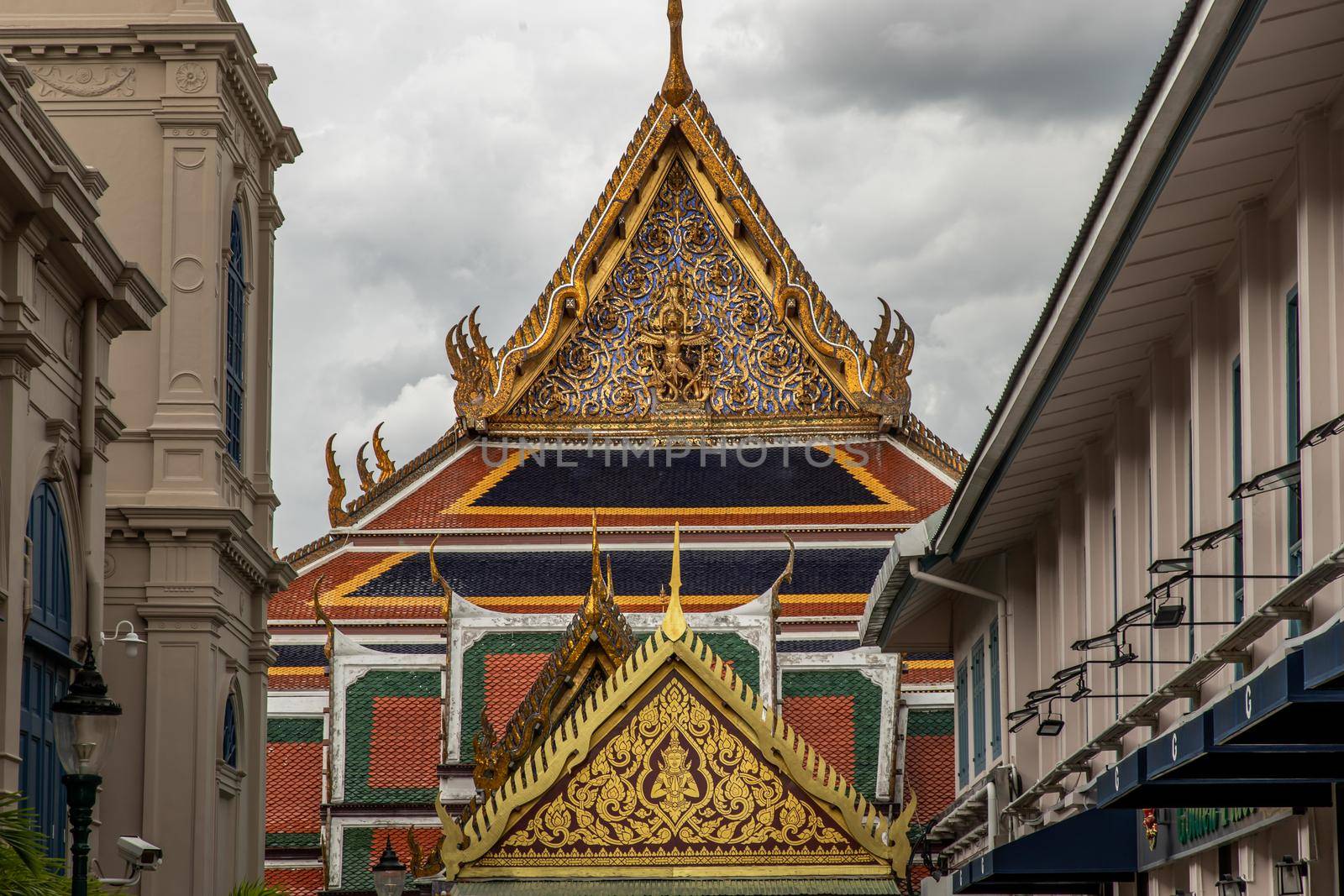 Bangkok, Thailand - Jun 19, 2020 : Beautiful Thai architecture of buildings in The Temple of the Emerald Buddha, the most sacred Buddhist temple in Thailand, it is also a potent religion symbolic of Thailand.
