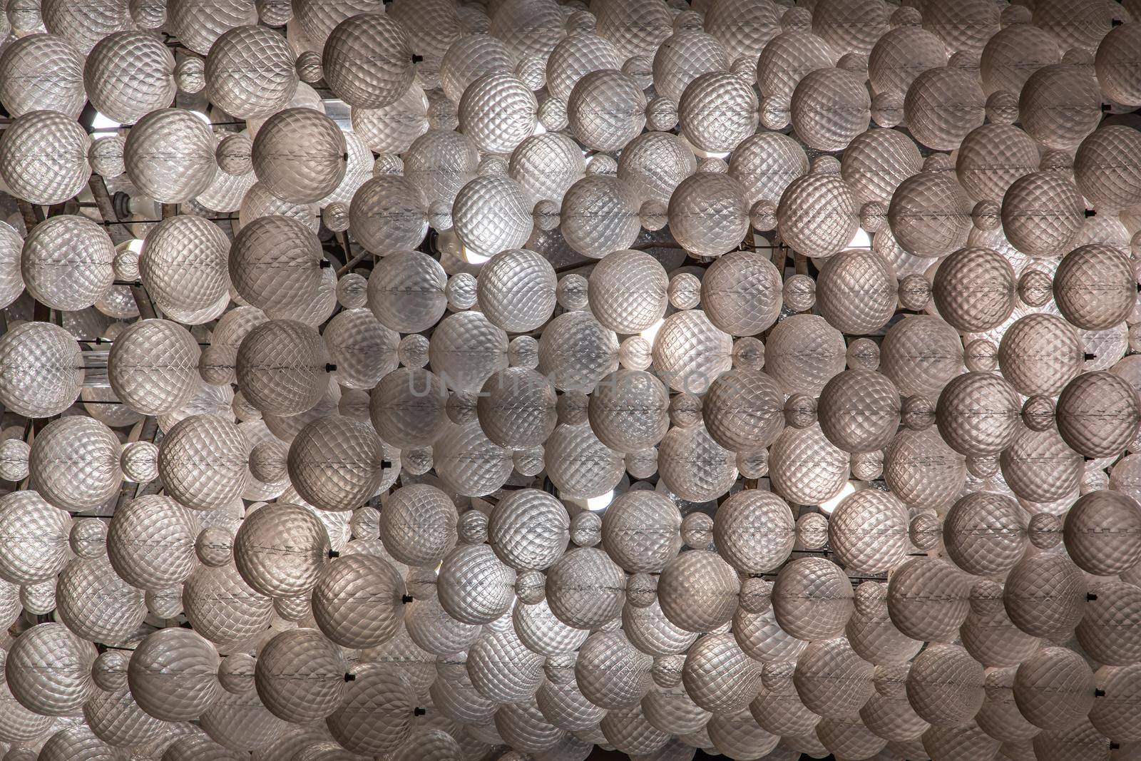 Close-up shot of White gorgeous vintage chandelier decoration.