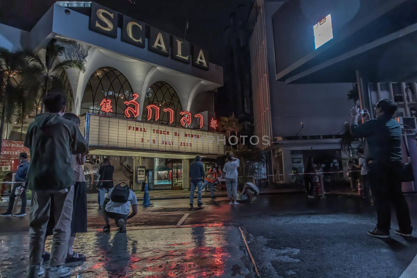 Bangkok, Thailand, Jul 03, 2020 : Group of public who are capturing memories of beautiful architecture of The Scala cinema at Siam Square.