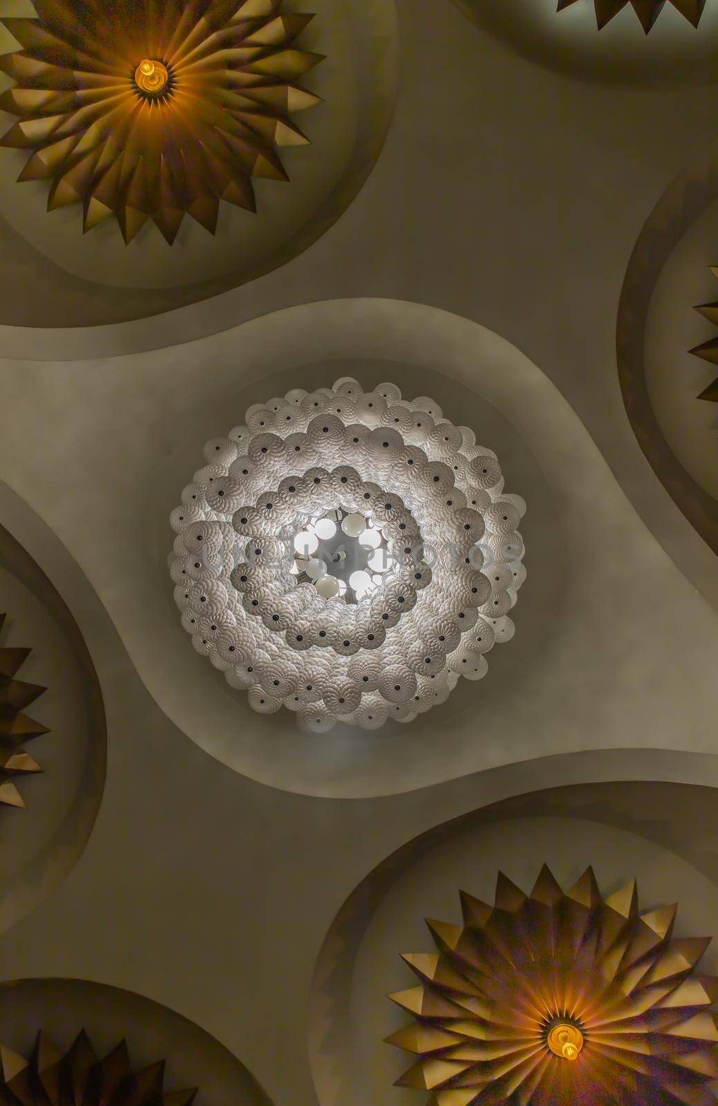 Bottom view of BWhite gorgeous vintage chandelier decoration at Siam Square. Cultural entertainment.