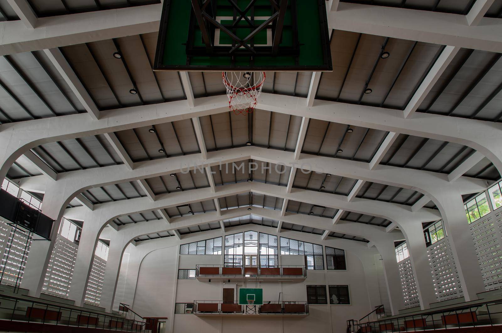 Bangkok, Thailand - Oct 04, 2020 : Empty basketball gym. Interior of a basketball hall. Copy space, Selective focus.