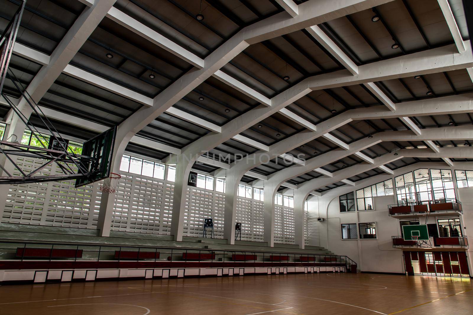 Bangkok, Thailand - Oct 04, 2020 : Empty basketball gym. Interior of a basketball hall. Copy space, Selective focus.