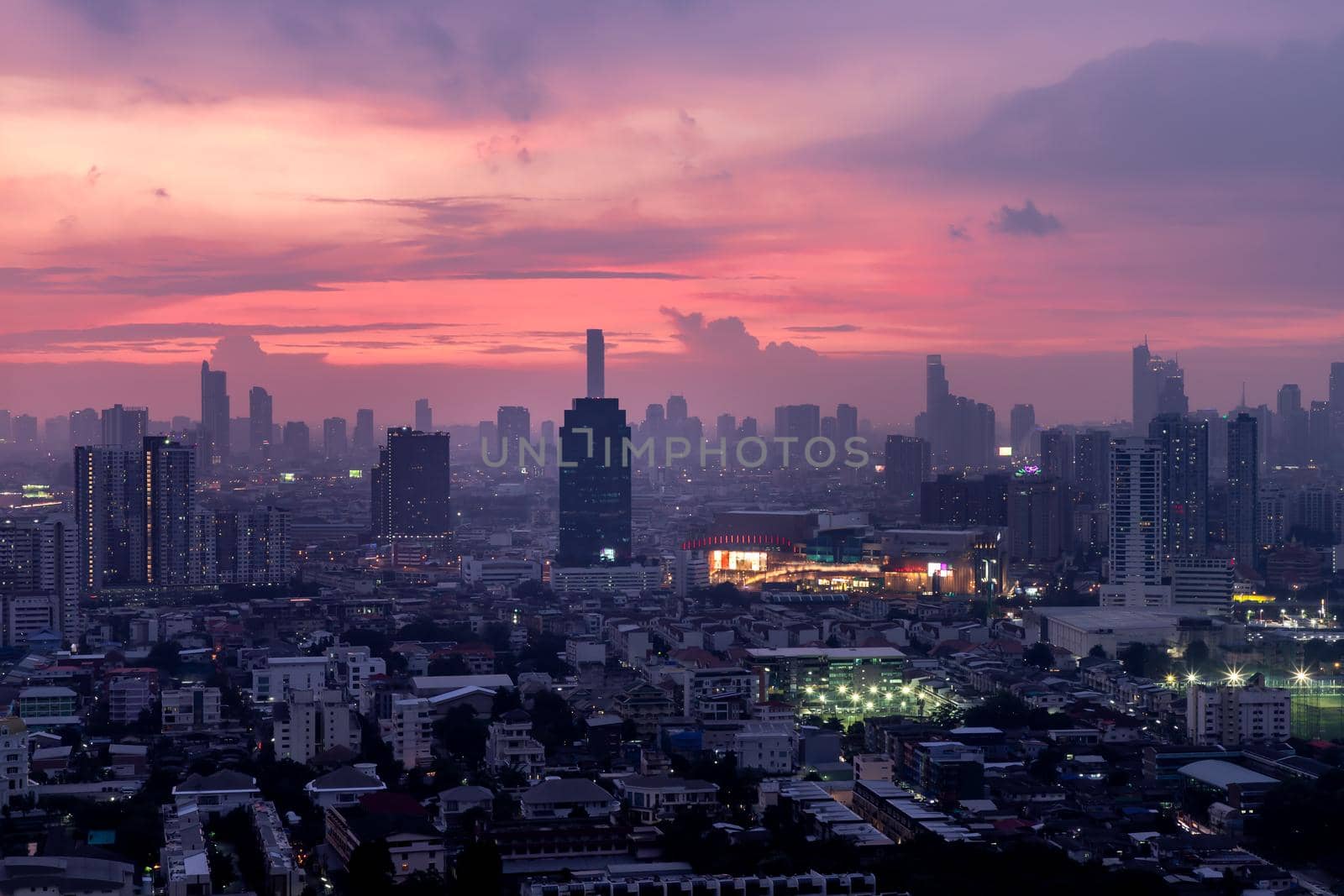 Bangkok downtown cityscape with skyscrapers at evening give the city a modern style. No focus, specifically.