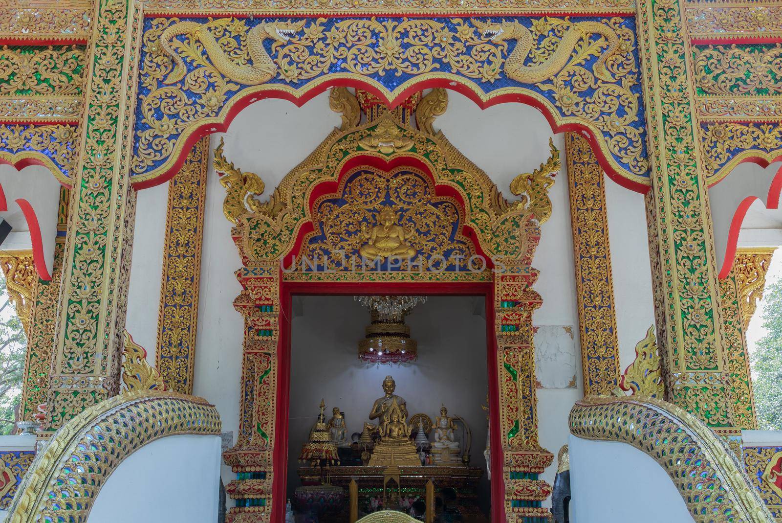 Chiang Rai, thailand - Sep 05, 2020 : The buddha image in main vihan at Phra That Doi Tung temple (Wat Phra That Doi Tung). Buddhist monastery and temple of public. Selective focus.