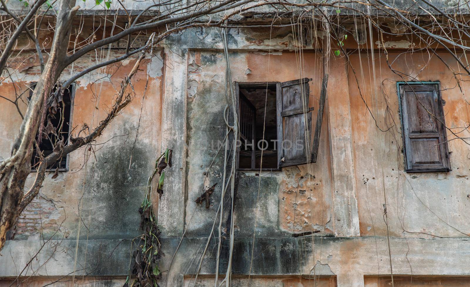 Old wooden windows on the old wall. Traditional Architecture style, Selective focus.