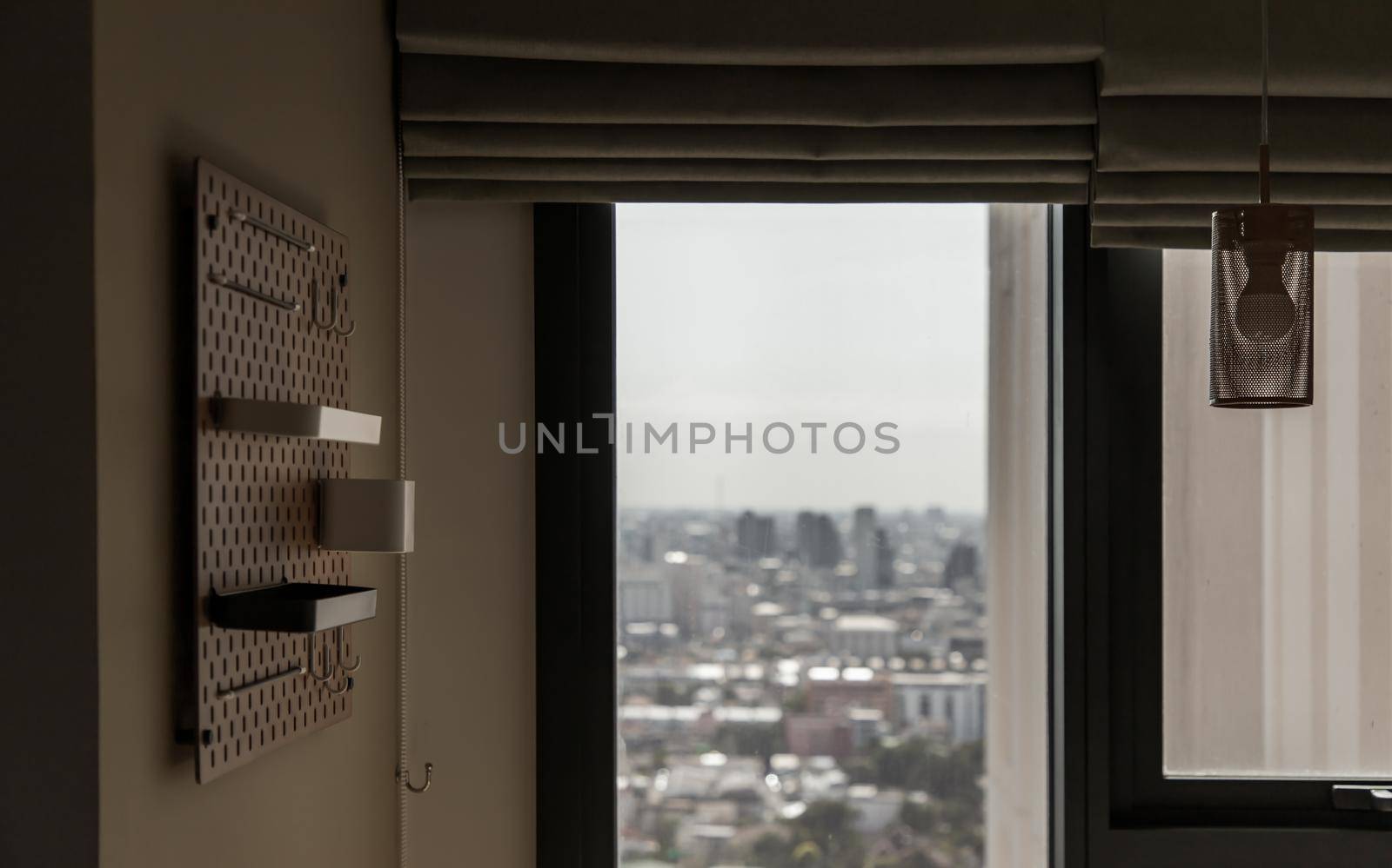 Detail of interior the living room at condominium with view city. Selective focus.