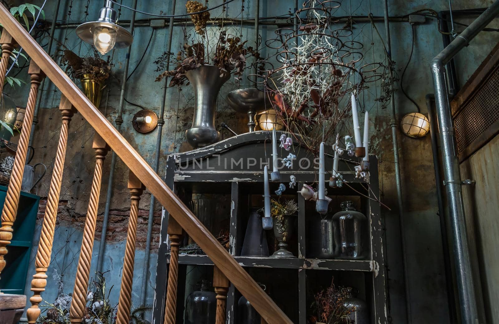 Bangkok, Thailand - Jun 26, 2020 : Interior design and decoration vintage style decorated with old brick wall and wooden staircase, Lamp and Dried flowers. No focus, specifically.