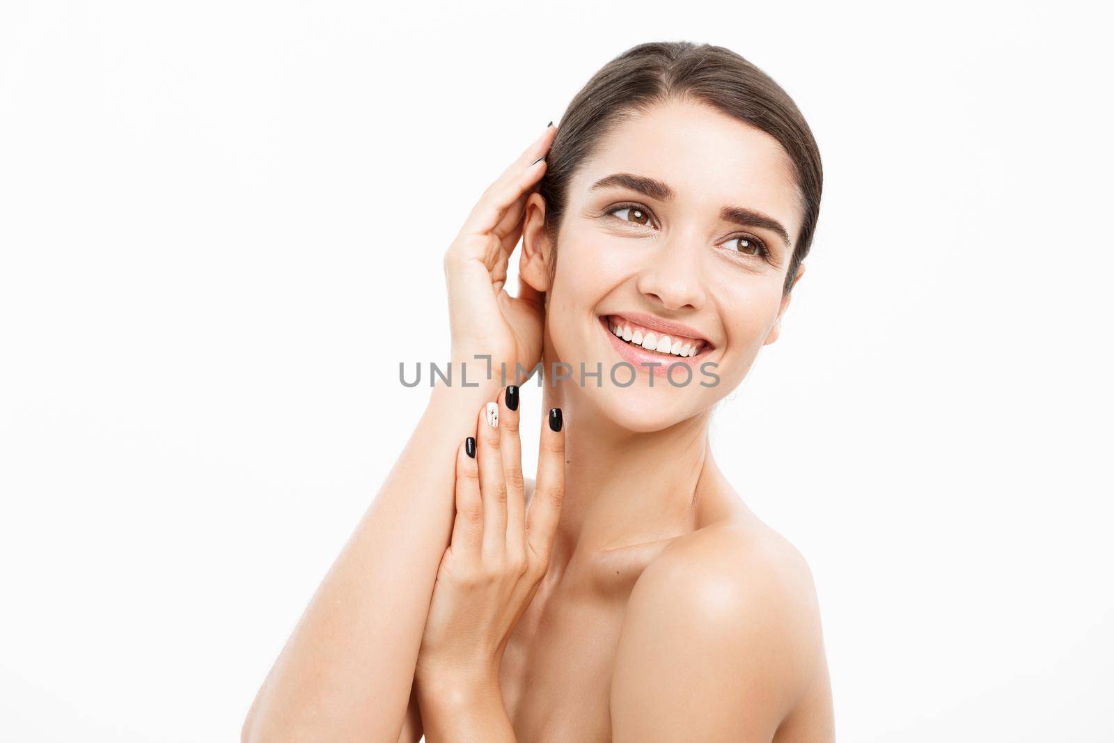 Beauty and spa concept - Charming young woman with perfect clear skin over white background. by Benzoix