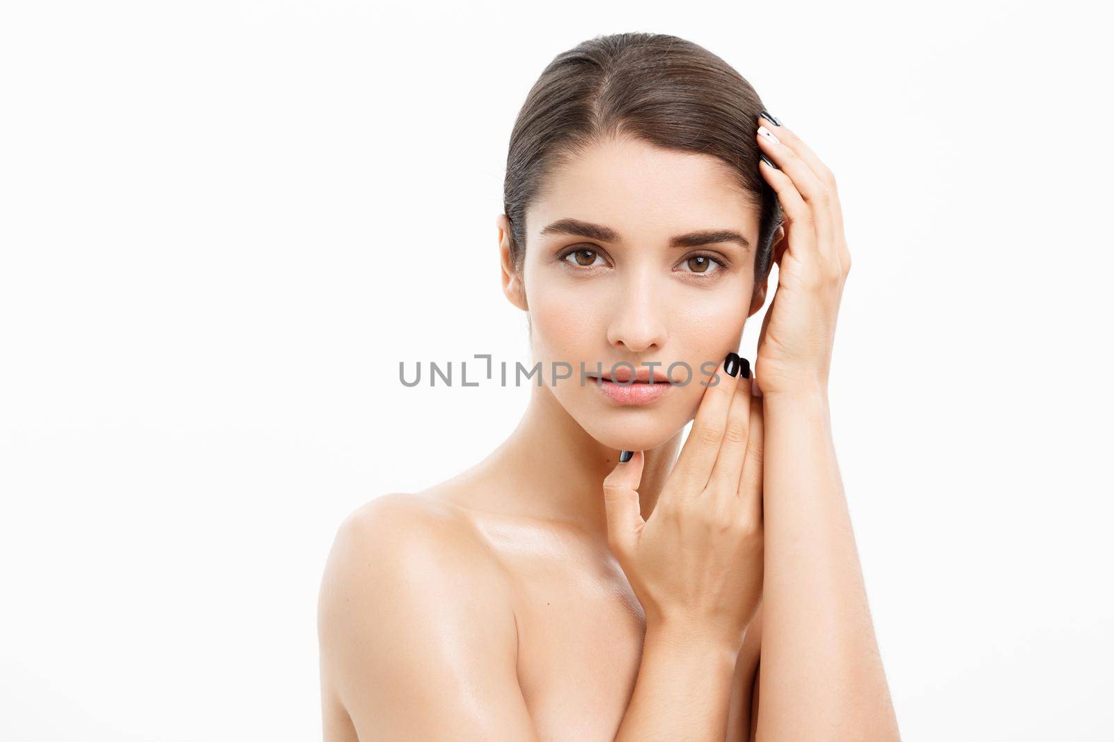 Beauty and spa concept - Charming young woman with perfect clear skin over white background. by Benzoix