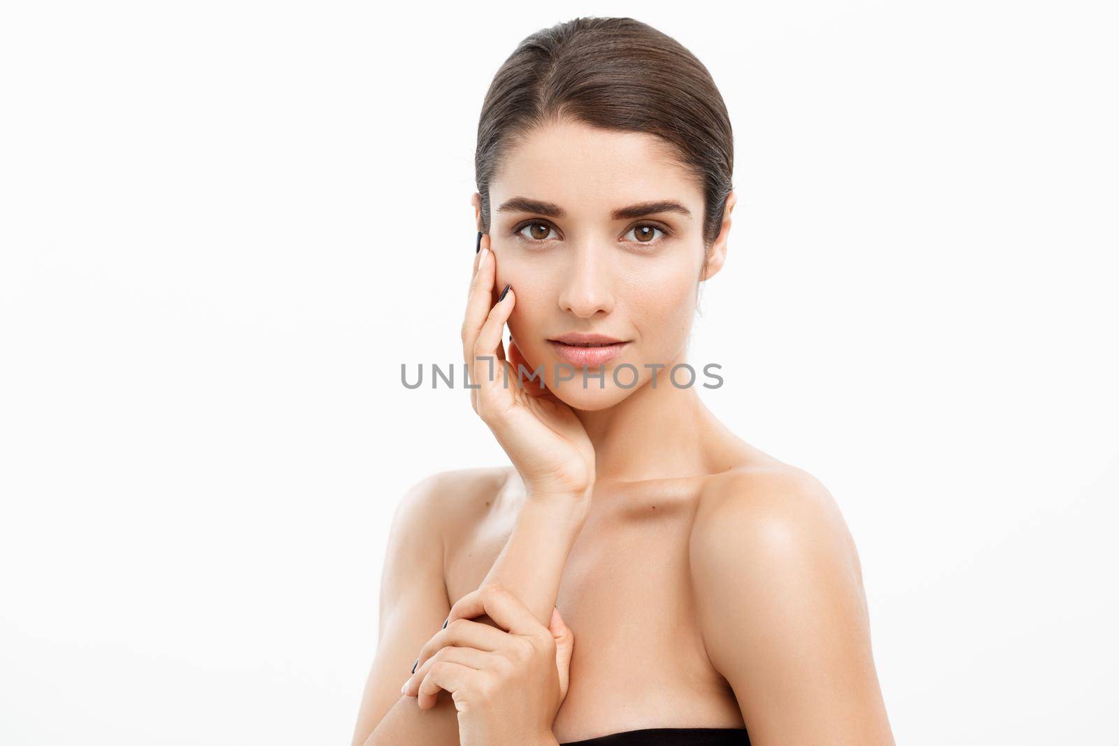 Beauty and spa concept - Charming young woman with perfect clear skin over white background. by Benzoix