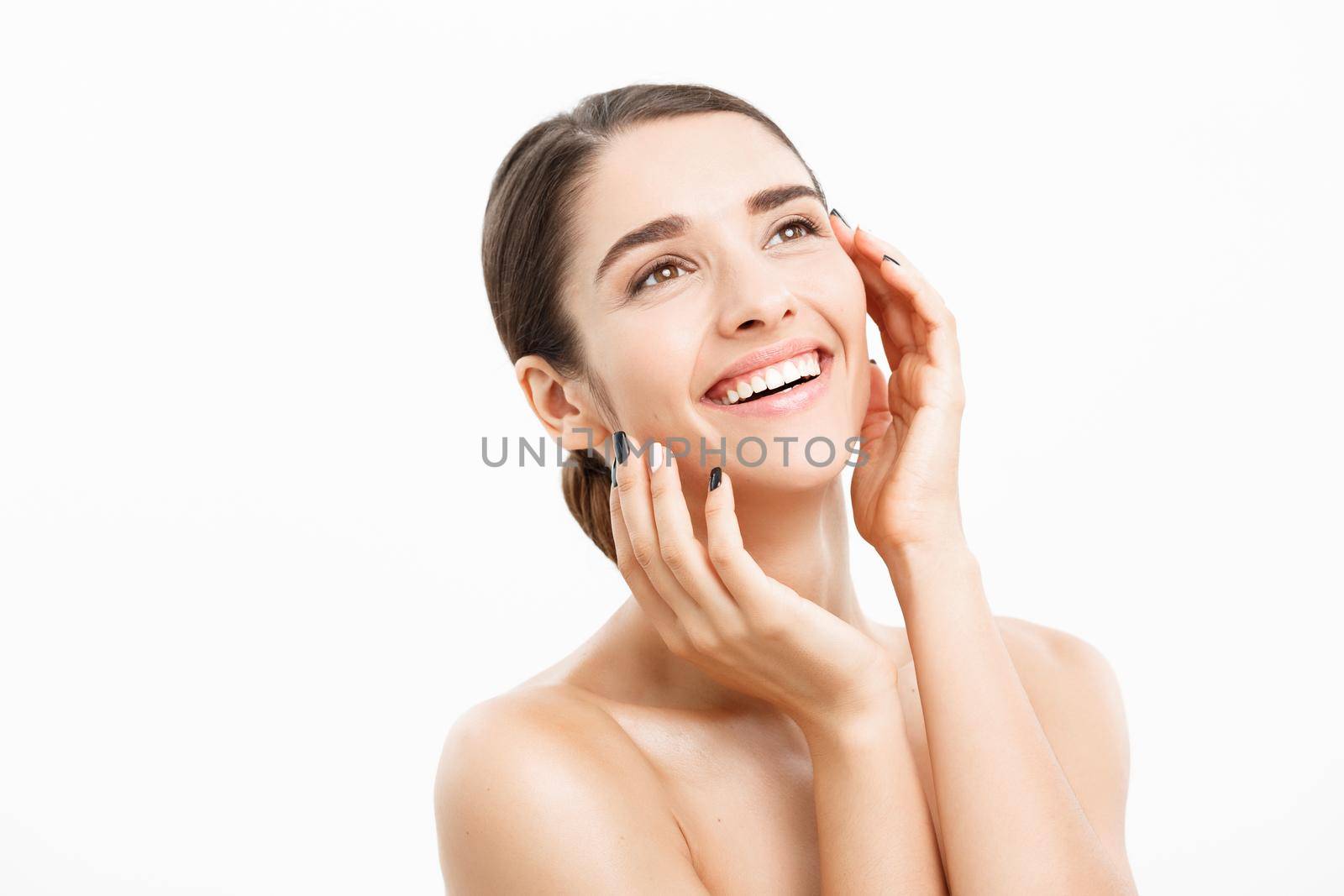 Beauty and Skin care concept - Close up Beautiful Young Woman touching her skin on white background. by Benzoix