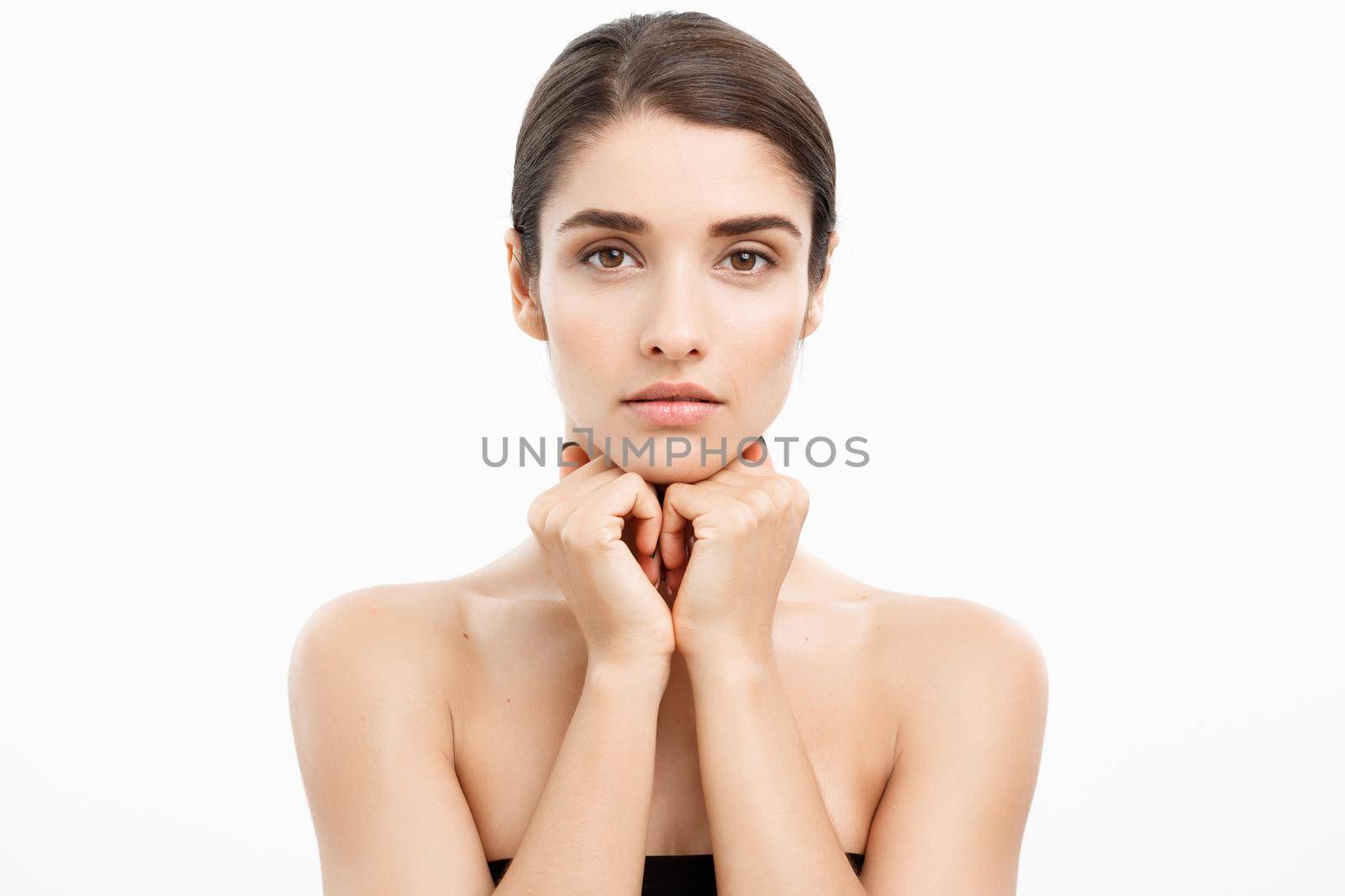 Beauty and spa concept - Charming young woman with perfect clear skin over white background. by Benzoix