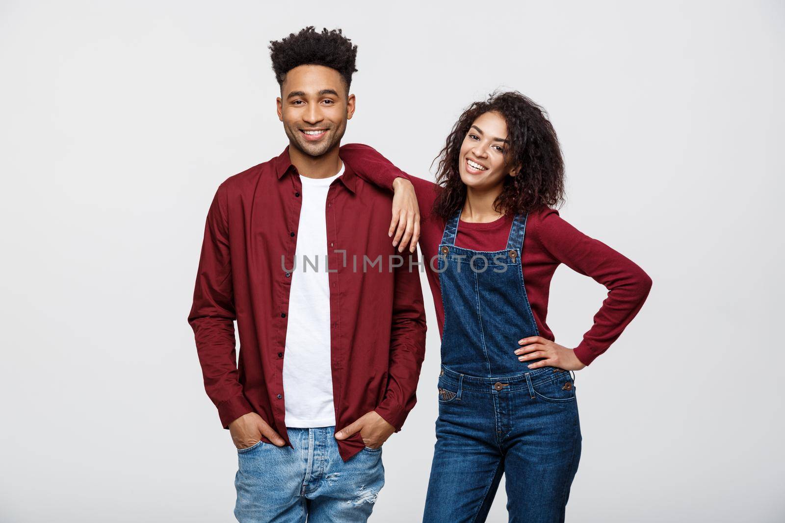 Beautiful portrait of a happy African American couple isolated over white.