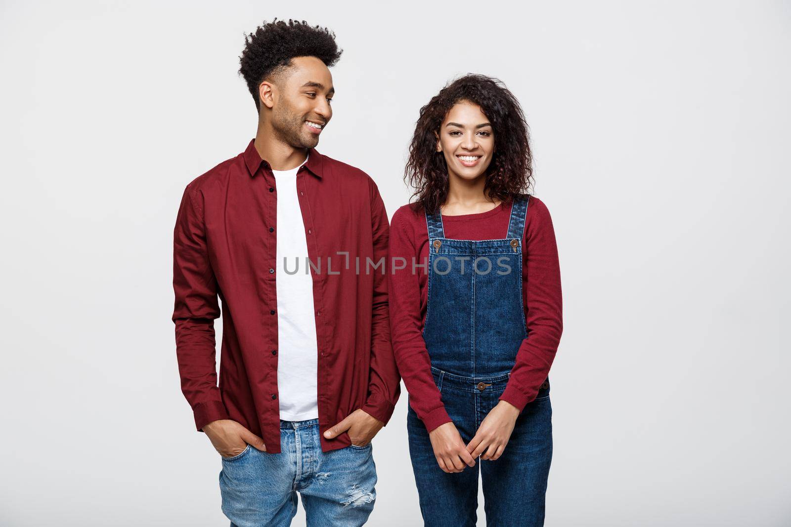 Beautiful portrait of a happy African American couple isolated over white.