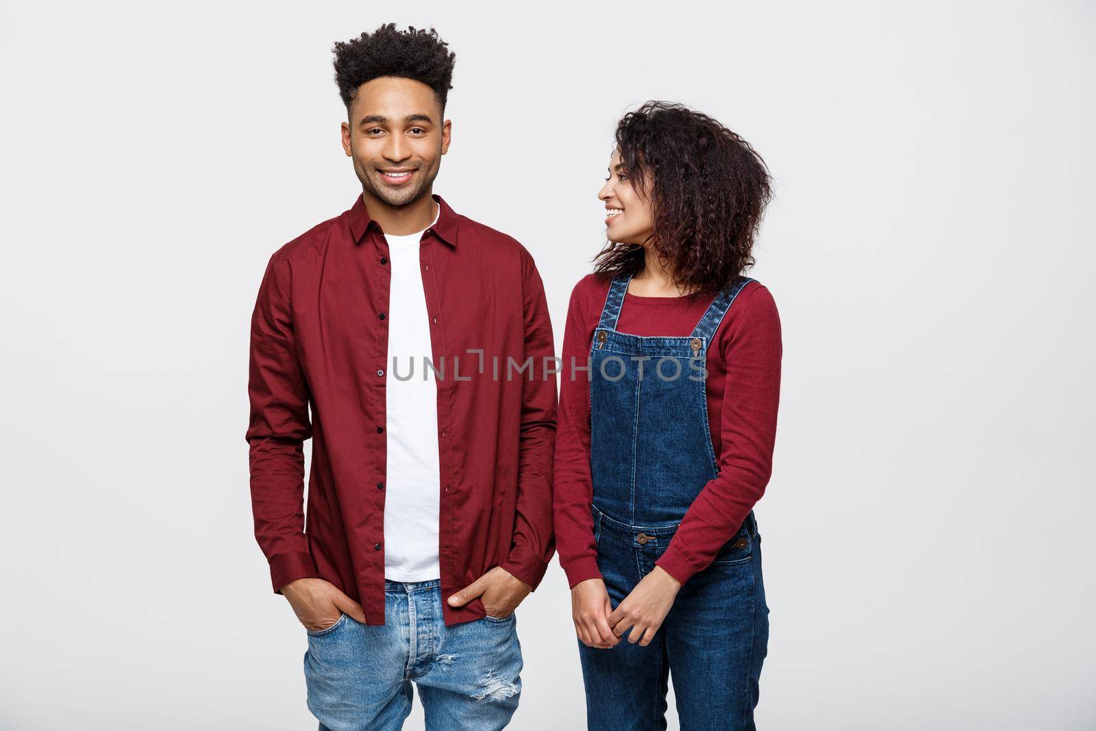 Beautiful portrait of a happy African American couple isolated over white.