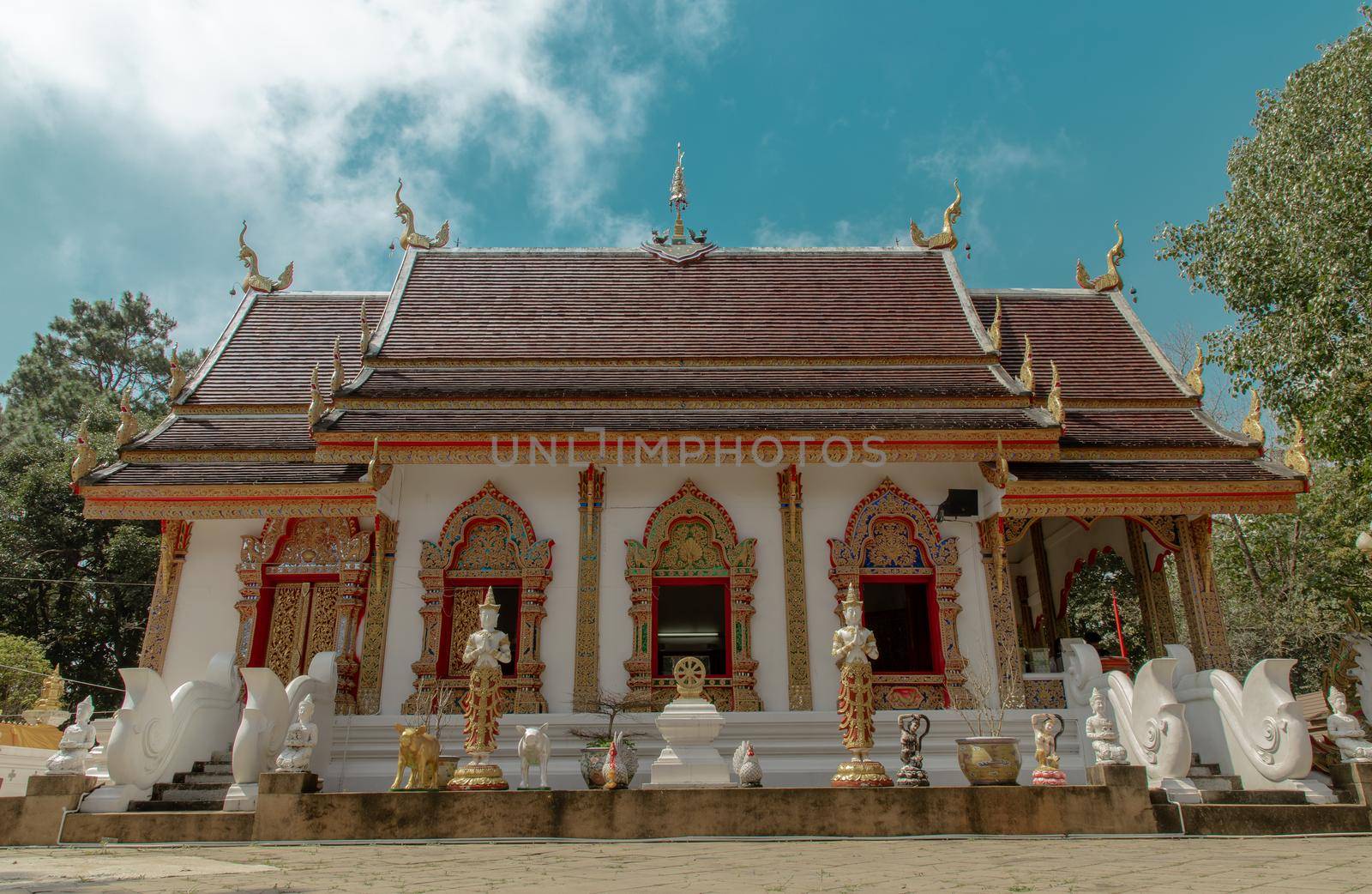 Phra That Doi Tung temple (Wat Phra That Doi Tung). Buddhist monastery and temple of public. Chiang Rai province Thailand. Selective focus.