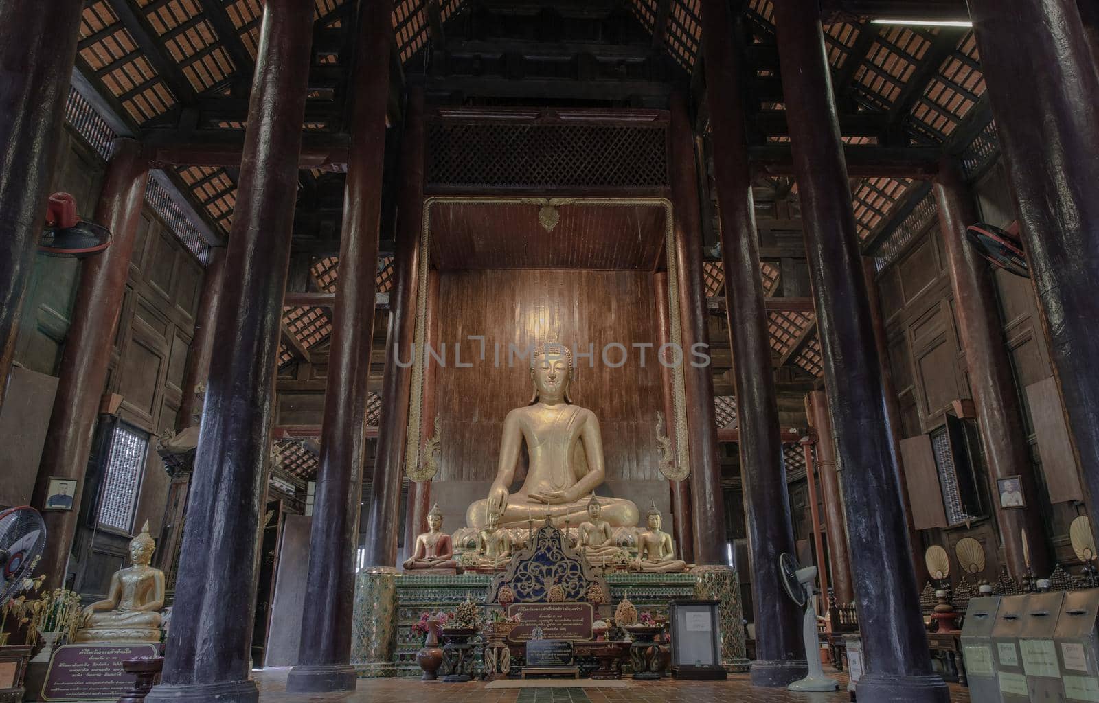 Chiangmai, Thailand - Sep 07, 2020 : The buddha image in main vihan at wat phun tao. Wat phan tao is a beautiful wooden temple in chiang mai. Selective focus.