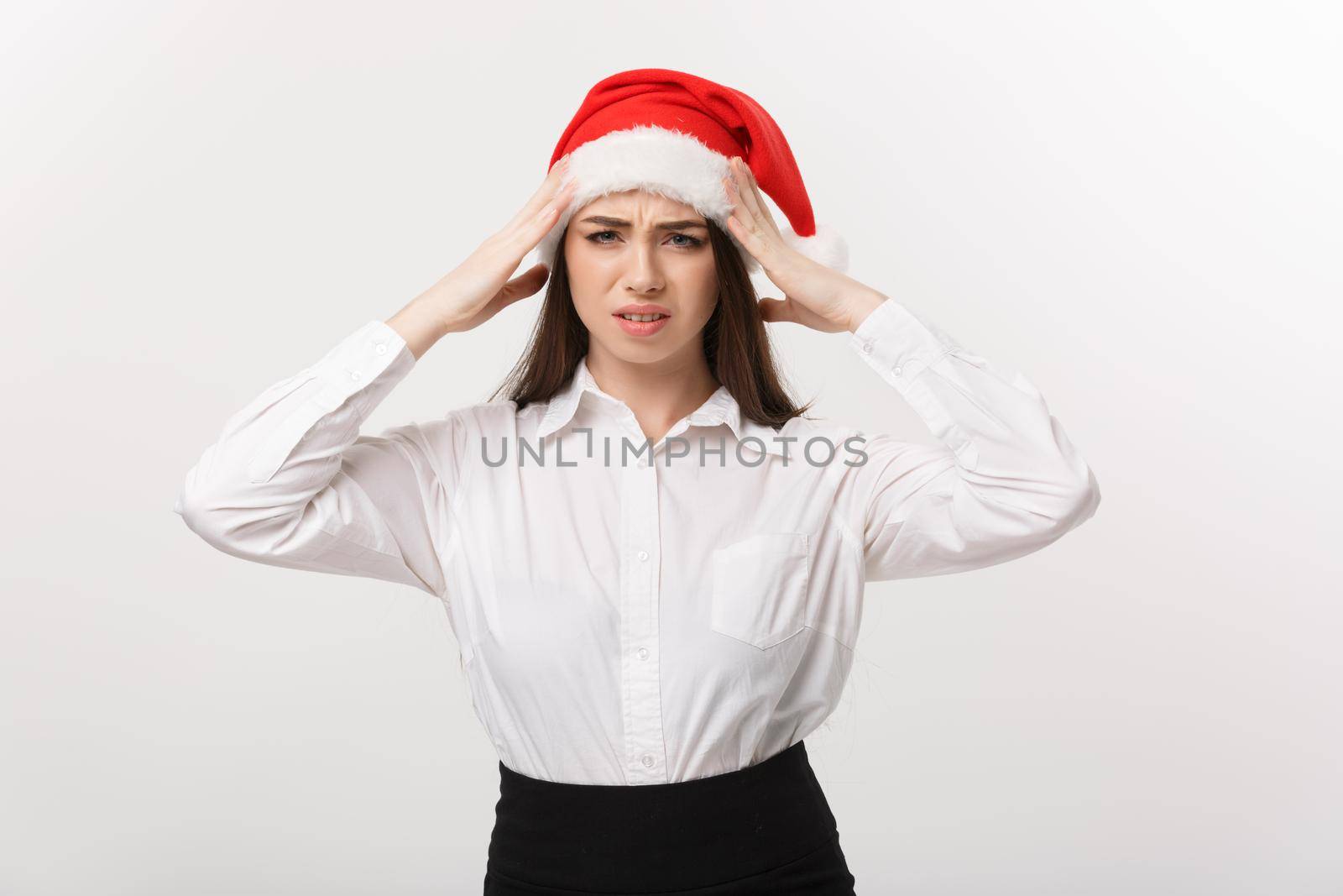 Business Concept - Modern caucasian business woman in christmas theme with serious thoughtful pose. by Benzoix