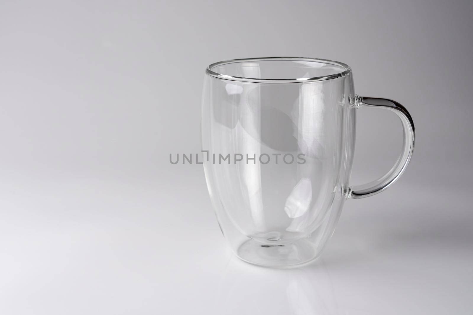 glass thermo mug on a white background. High quality photo