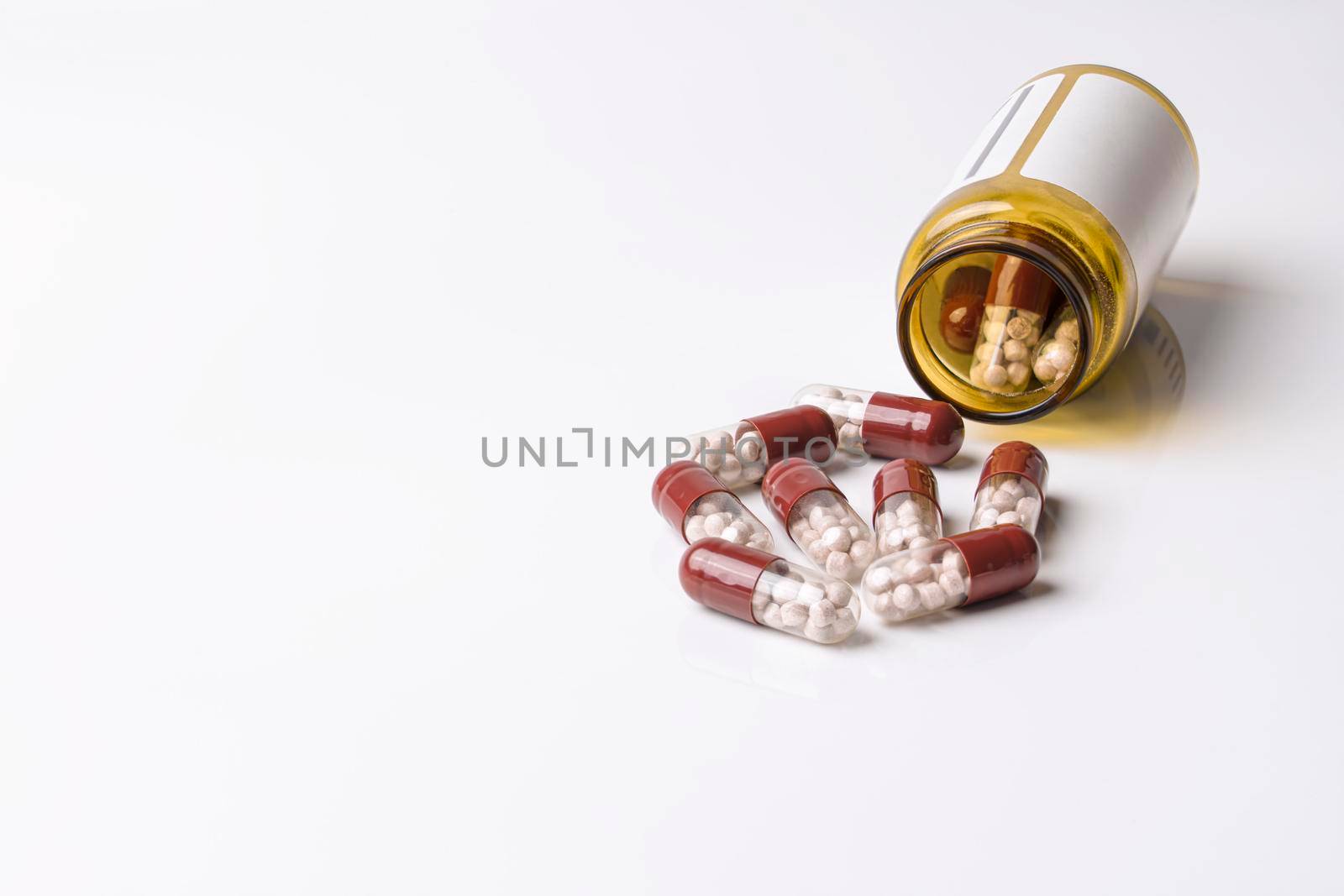 medicine medical preparation in capsules on a white background. High quality photo