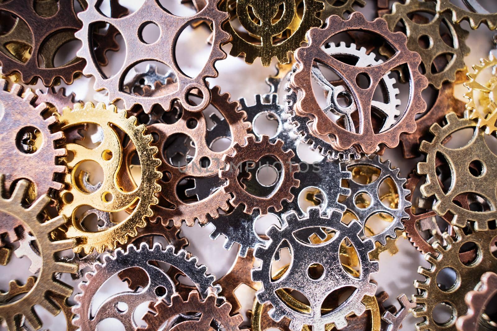 Close up of gear wheels and cogs by Mendelex