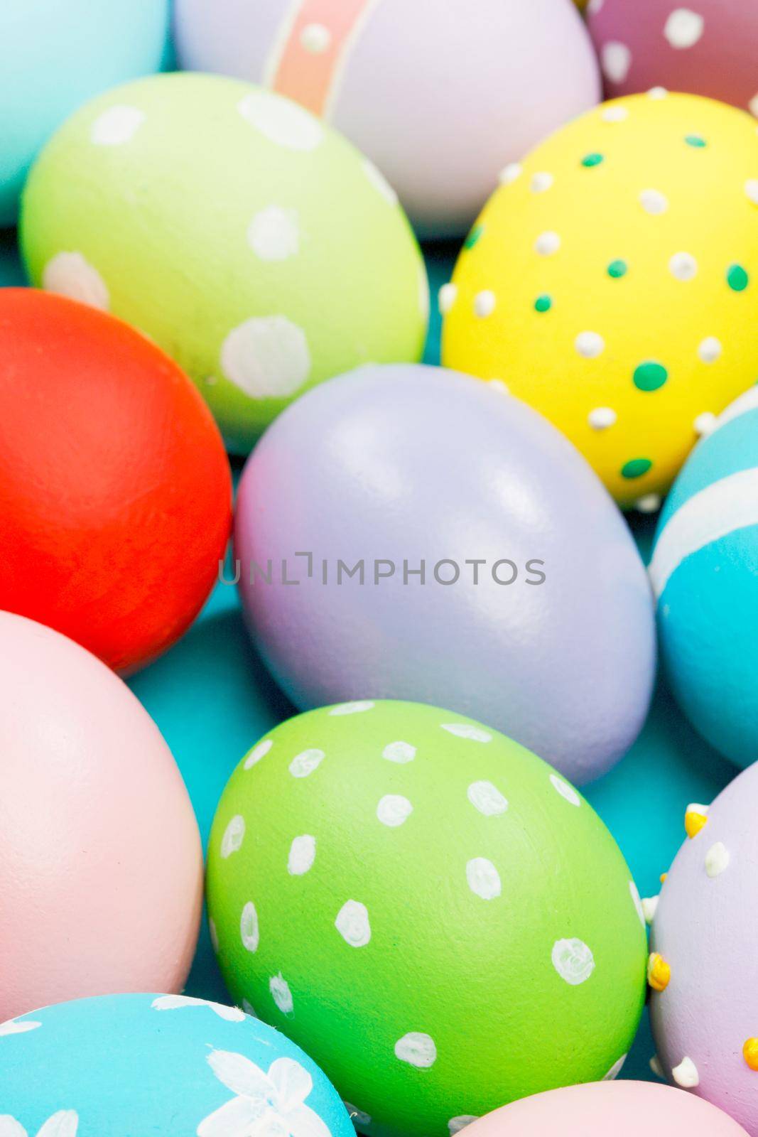 Beautiful background of many colorful easter eggs top view