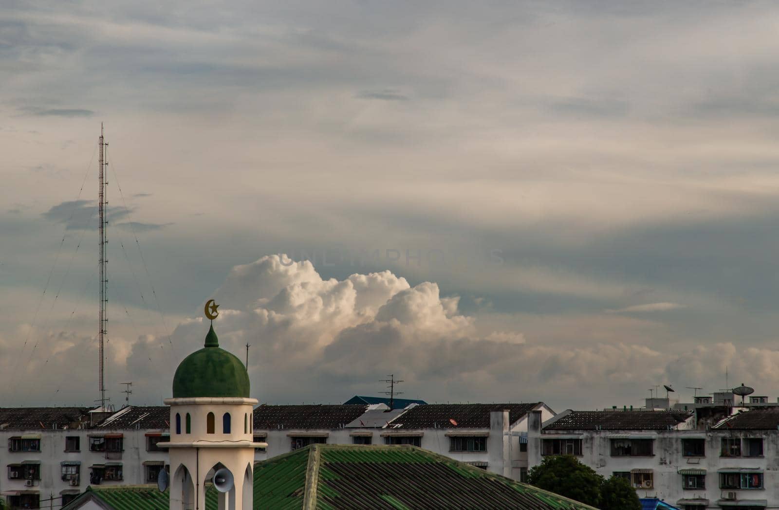 Aerial view of Mosque (Muslim mosque) at sunset in Bangkok, Islamic mosque dome, Green mosque dome, Copy space, Selective focus.