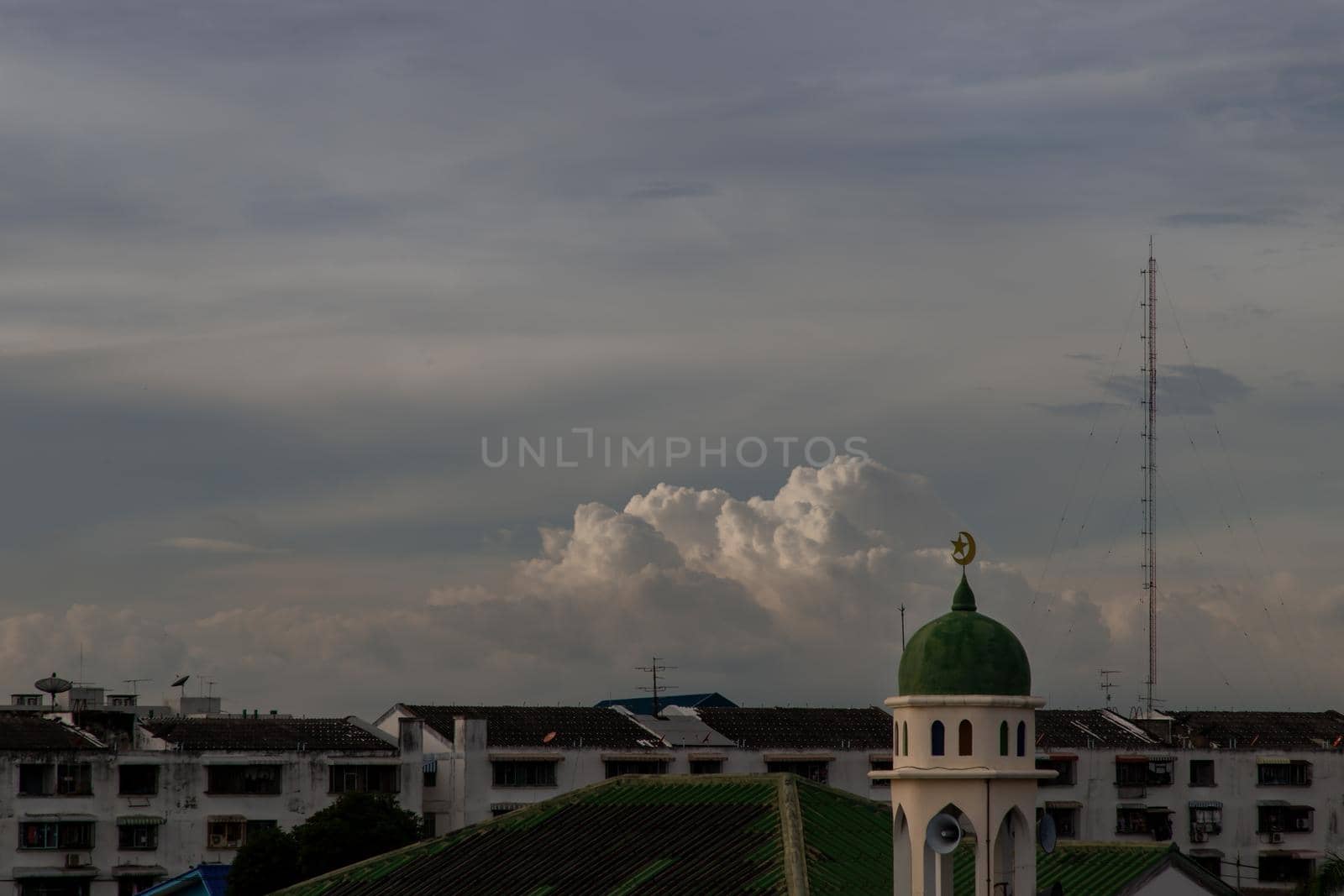 Aerial view of Mosque (Muslim mosque) at sunset in Bangkok, Islamic mosque dome, Green mosque dome, Copy space, Selective focus.