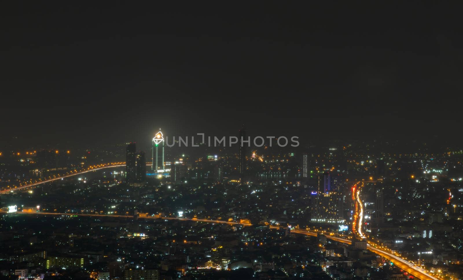 Bangkok, thailand - Nov 07, 2020 : Bangkok downtown cityscape with skyscrapers at night give the city a modern style. No focus, specifically.